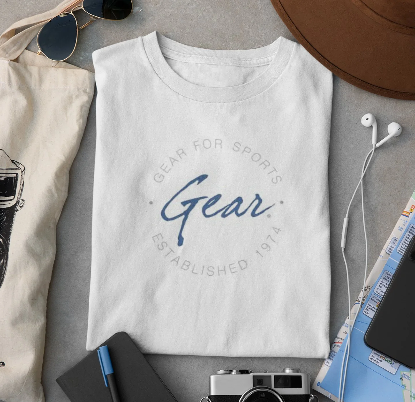 mockup-of-a-folded-t-shirt-placed-between-some-accessories-33794.jpg