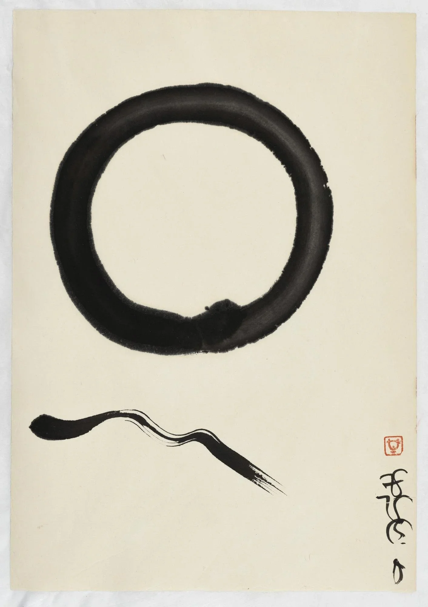 Traditional sumi-e Japanese ink painting with a large black circle and a wavy line below, along black ink signature and a red seal stamp in the bottom right corner by Ayan Rivera.