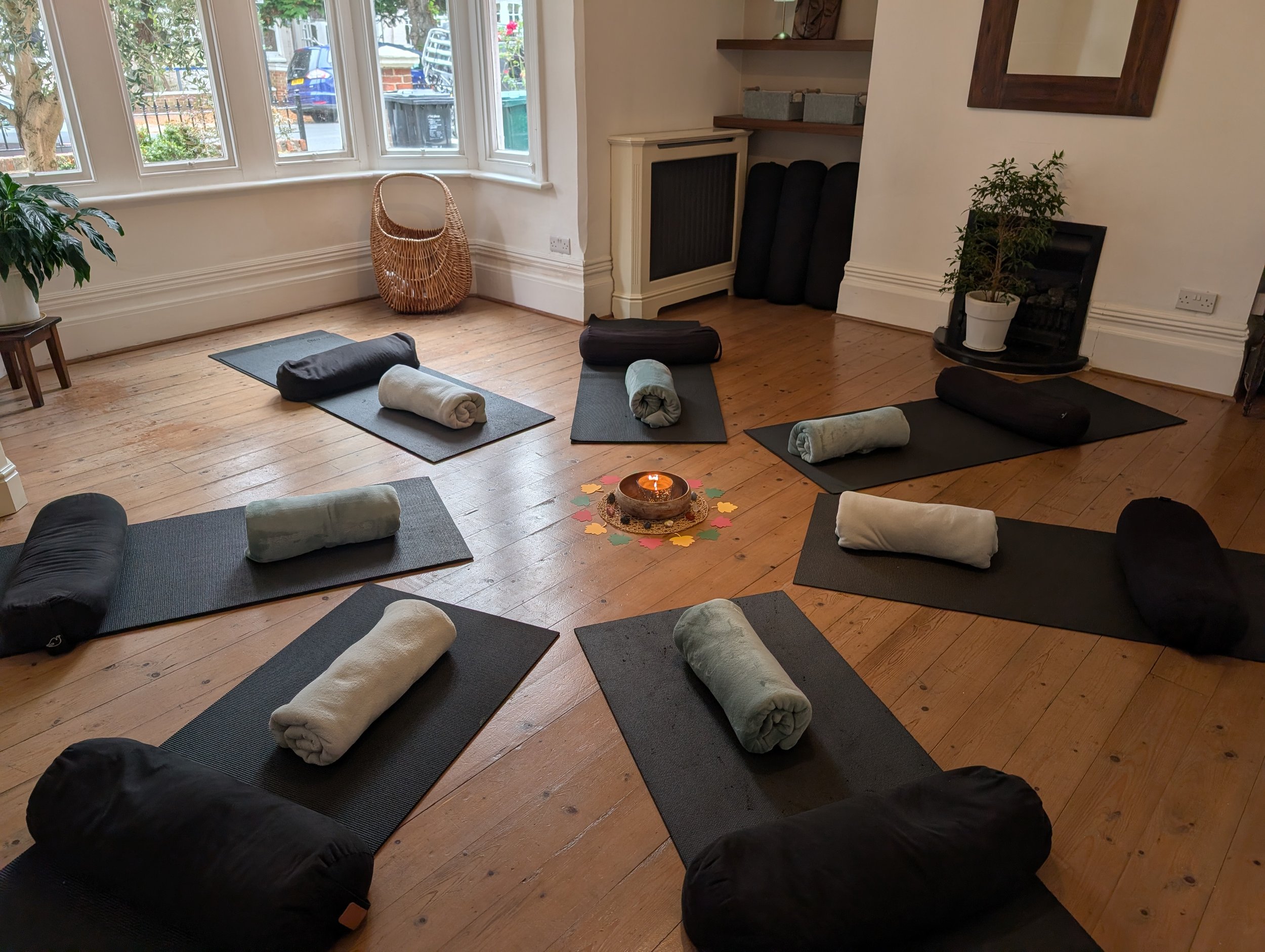 Yoga mats, blankets and bolsters arranged for an intimate half-day retreat in Hove