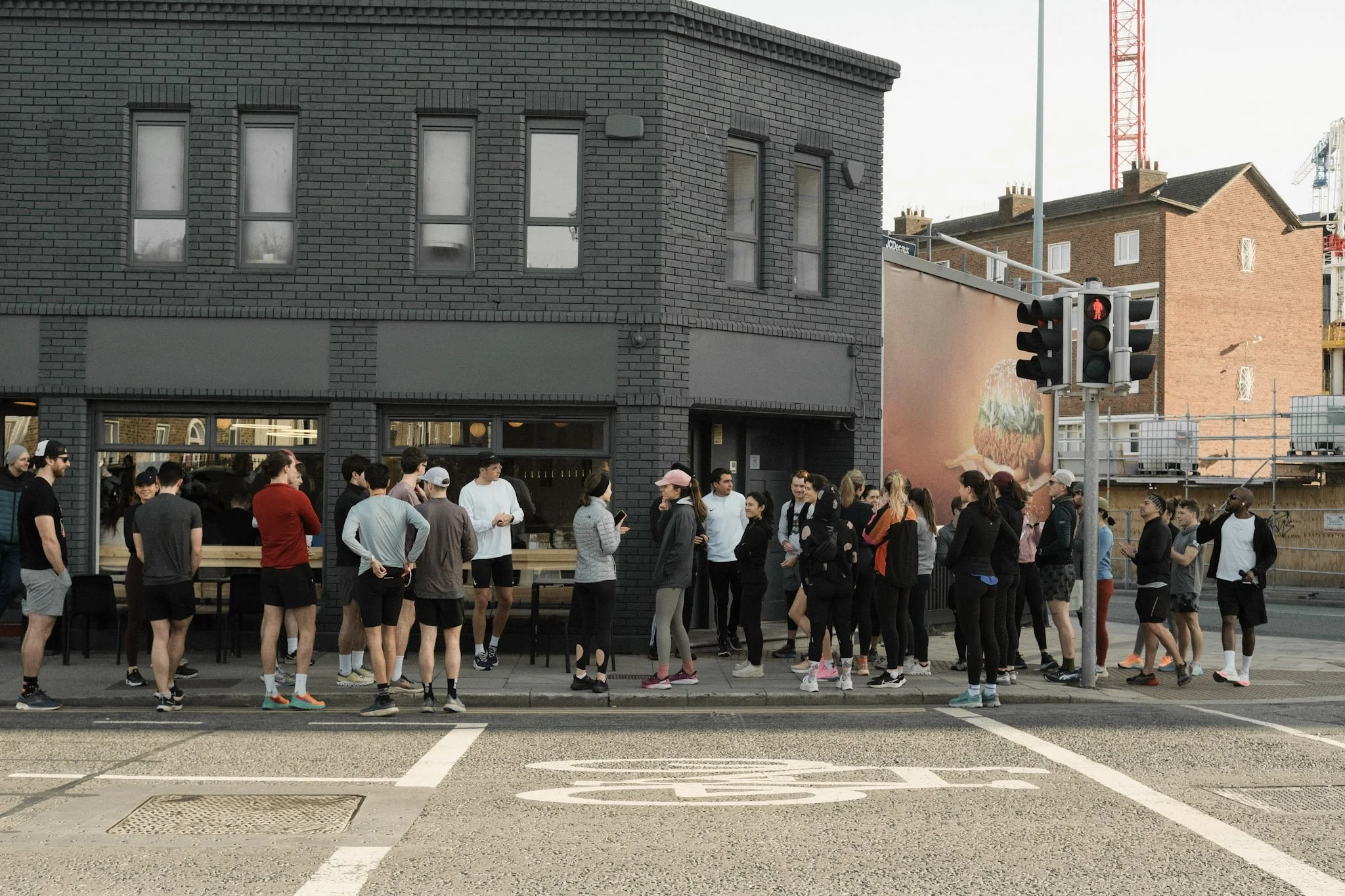 Group of people listening to our pre-run announcement in 3fe Grand Canal.