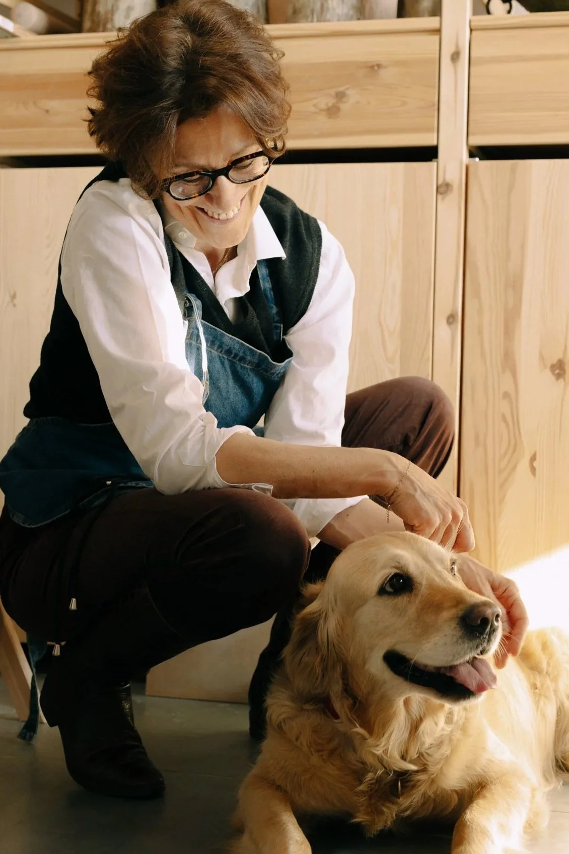 Portrait of ceramic artist Ottavia Sitia with her dog, Mela