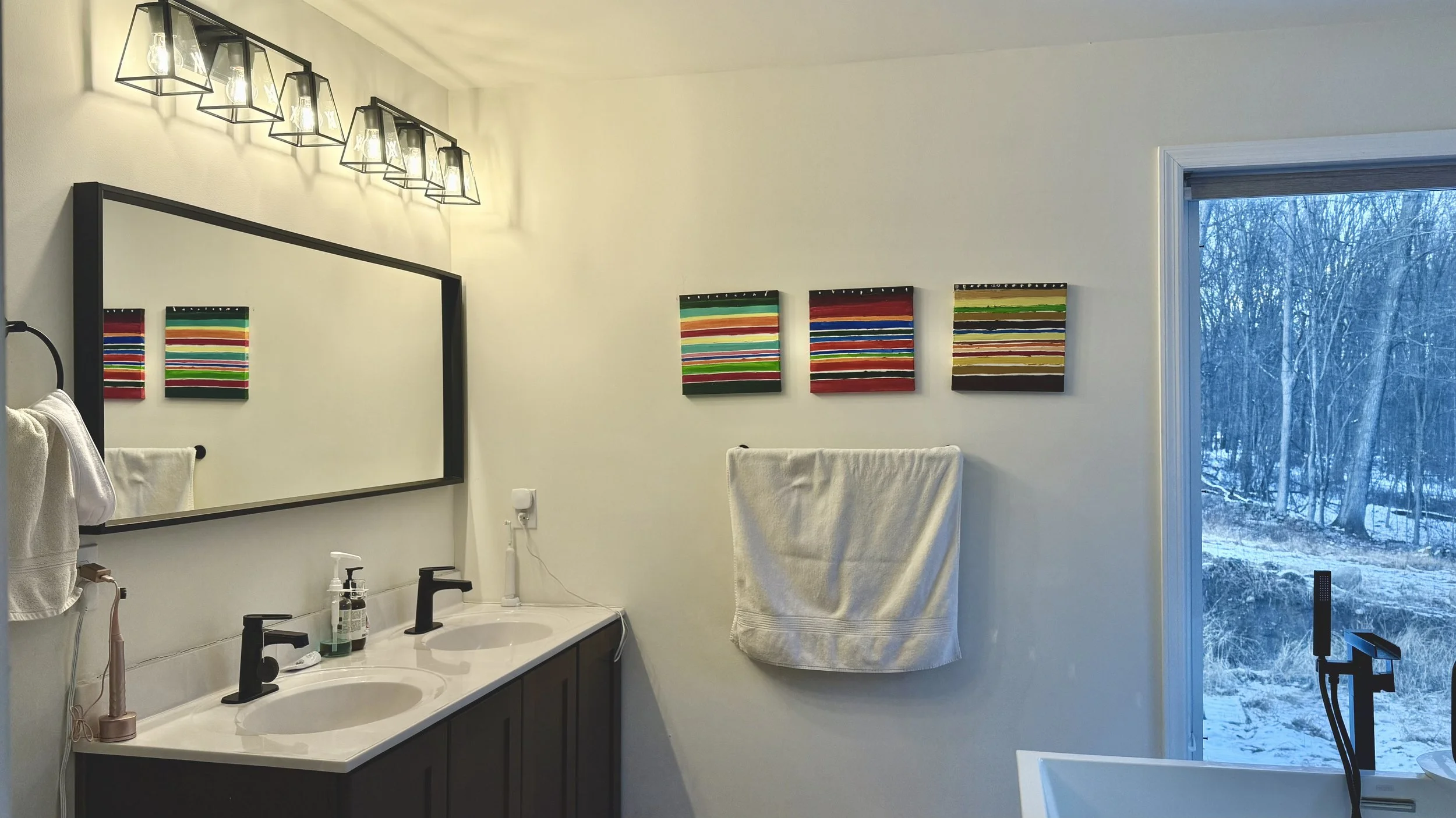 The main bathroom with a tub and shower.