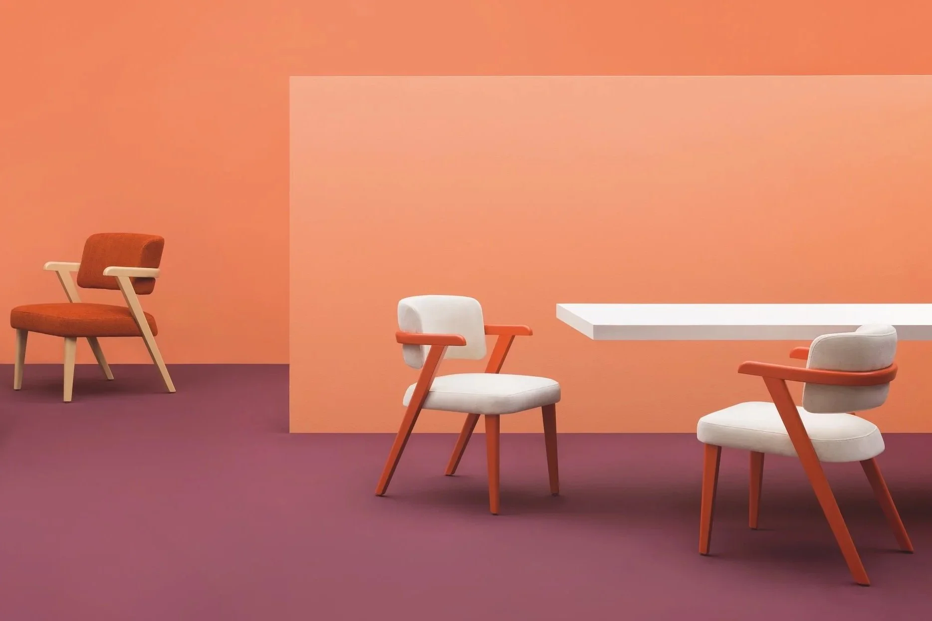 Modern interior scene with two chairs and a floating shelf against a pink and peach wall with a pink floor.