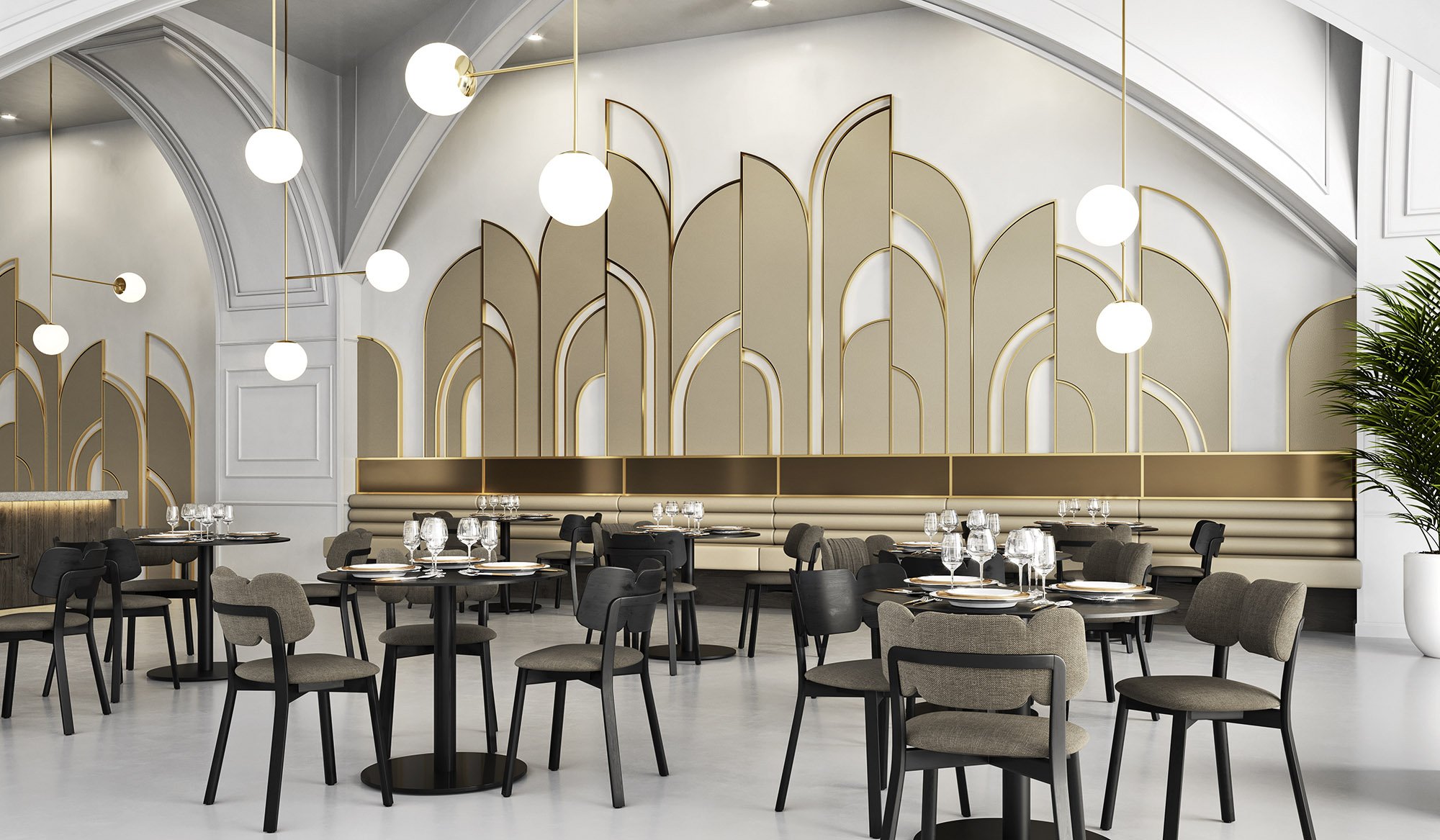 Elegant restaurant interior with modern design, featuring black and gray chairs around black tables set with glassware and plates, decorative gold accents on the light fixtures and wall panels, and a large potted plant on the right side.