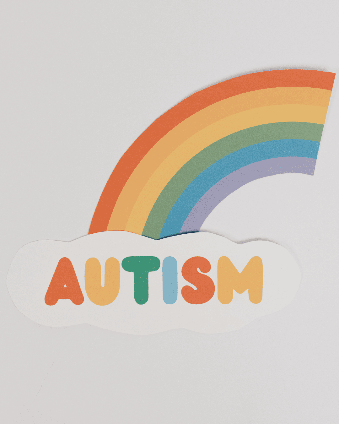 rainbow craft with a cloud spelling the word autism