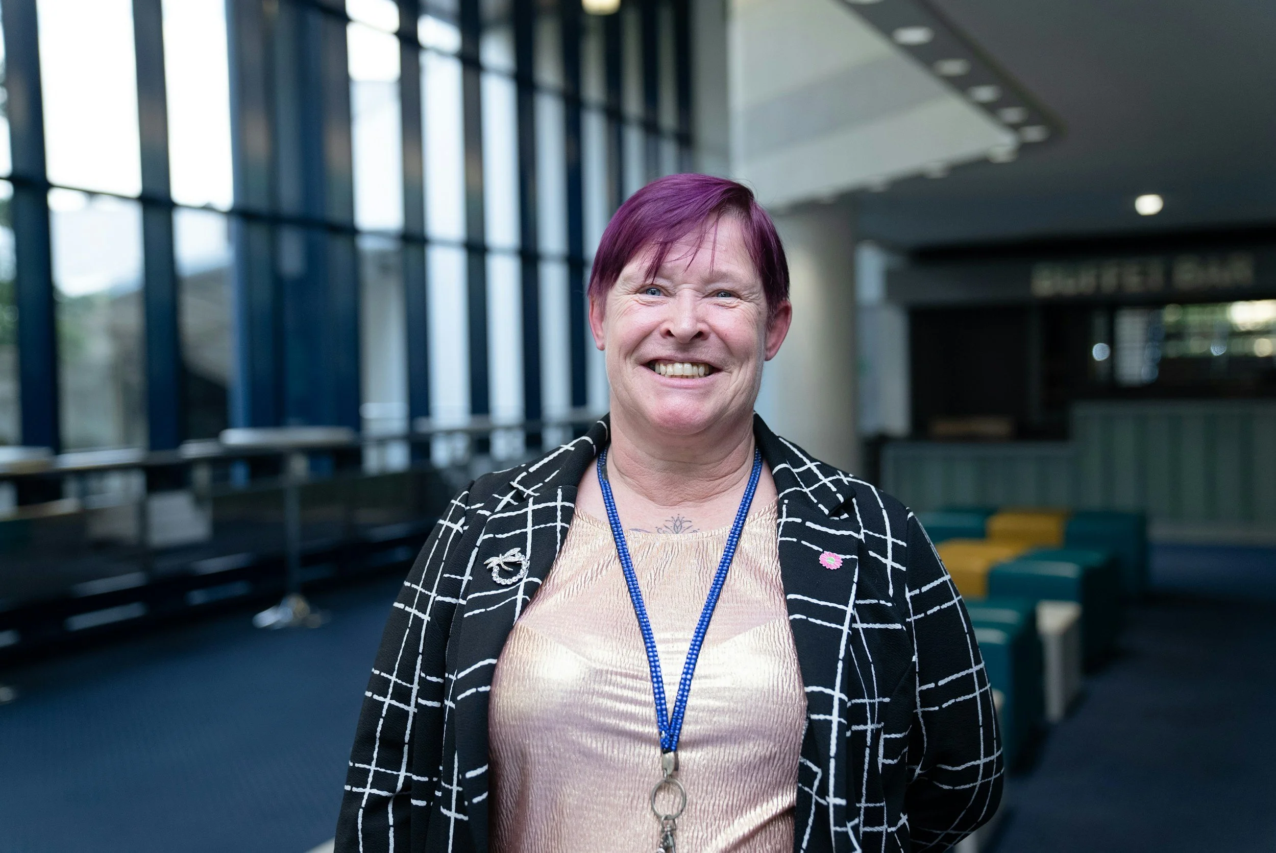 friendly professional woman smiles at the camera