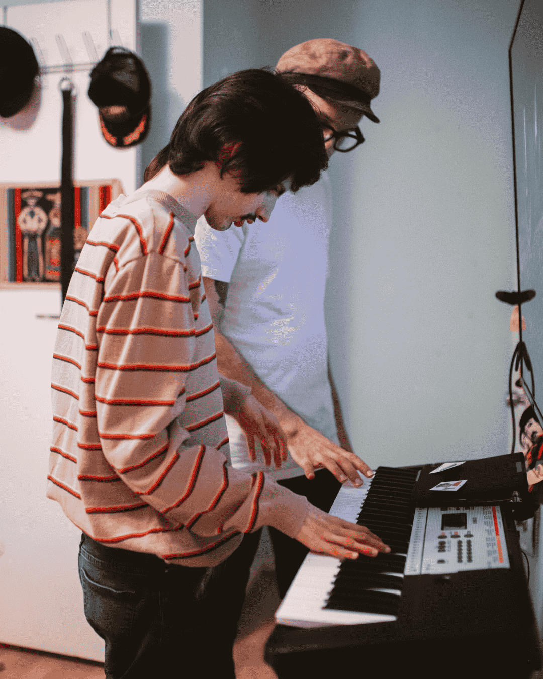 a young autistic man learns how to play the piano