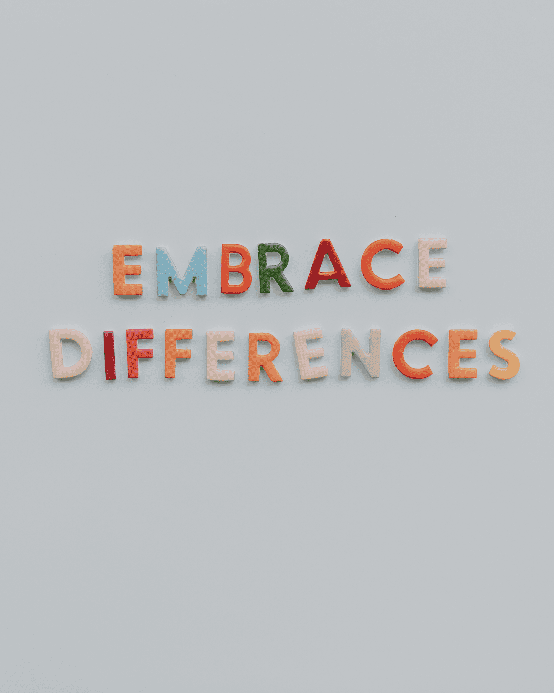 colourful text reads embrace differences