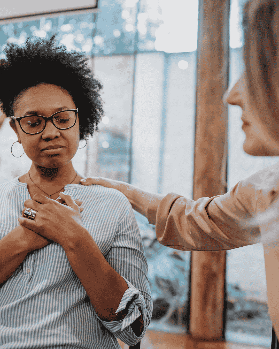 a woman speaks to a health care professional for support