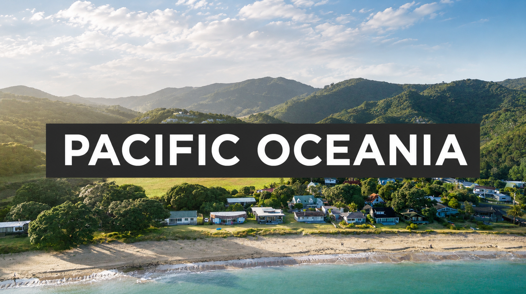 Aerial view of a coastal landscape with a sandy beach, green trees, residential houses, mountains in the background, under a partly cloudy sky, with the text 'Pacific Oceania' overlaid.