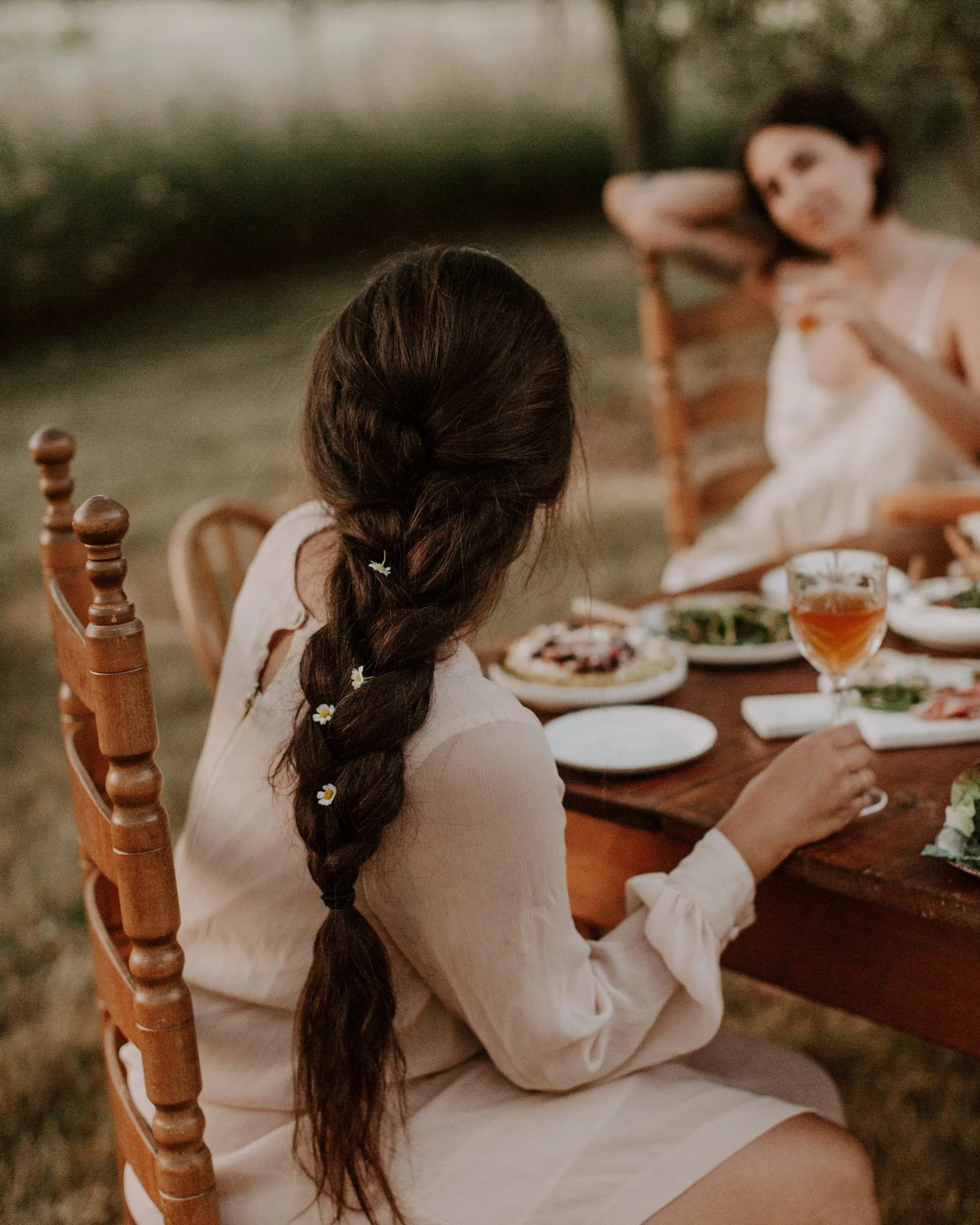 women socializing enjoying food together