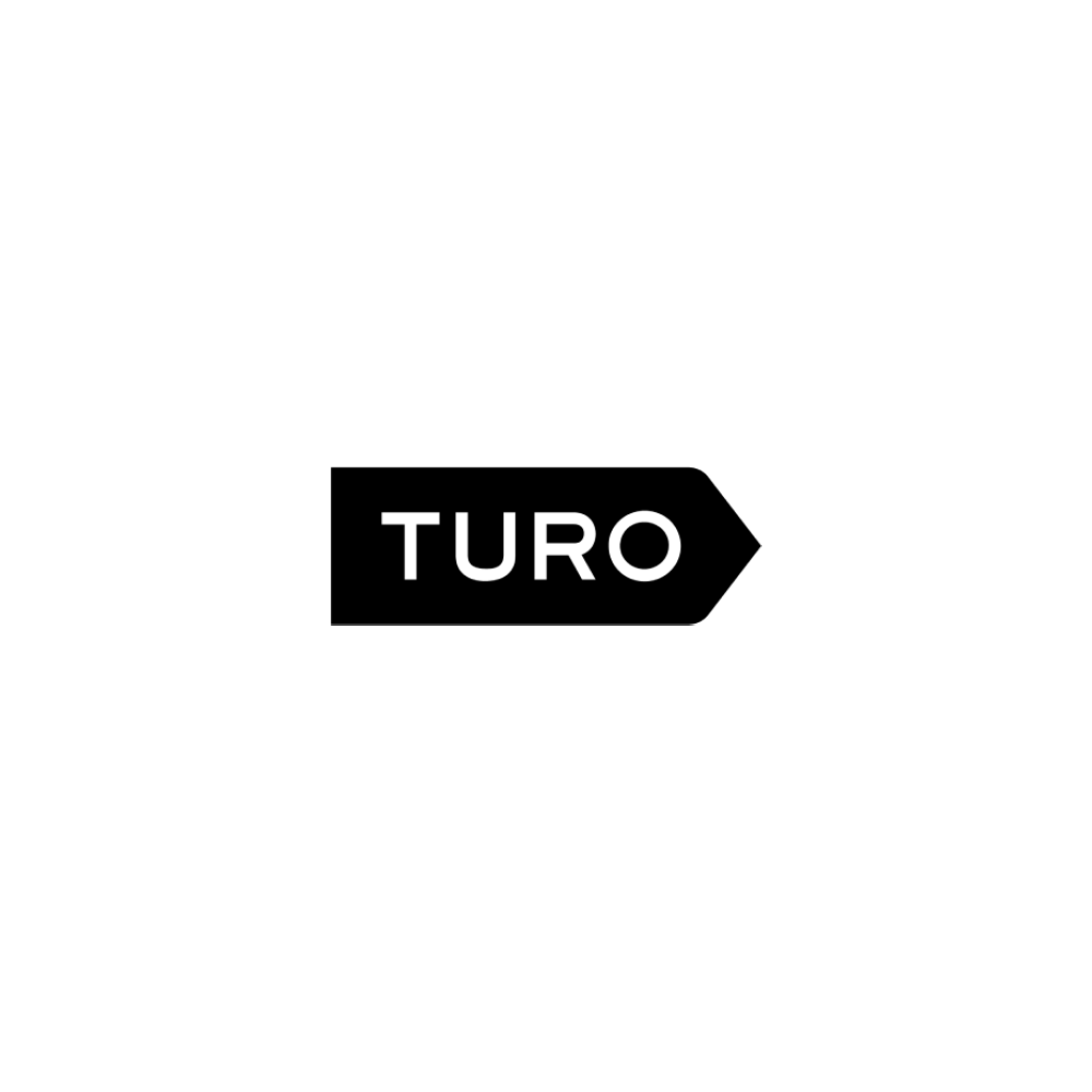 Black directional sign with the word 'TURO' in white lettering
