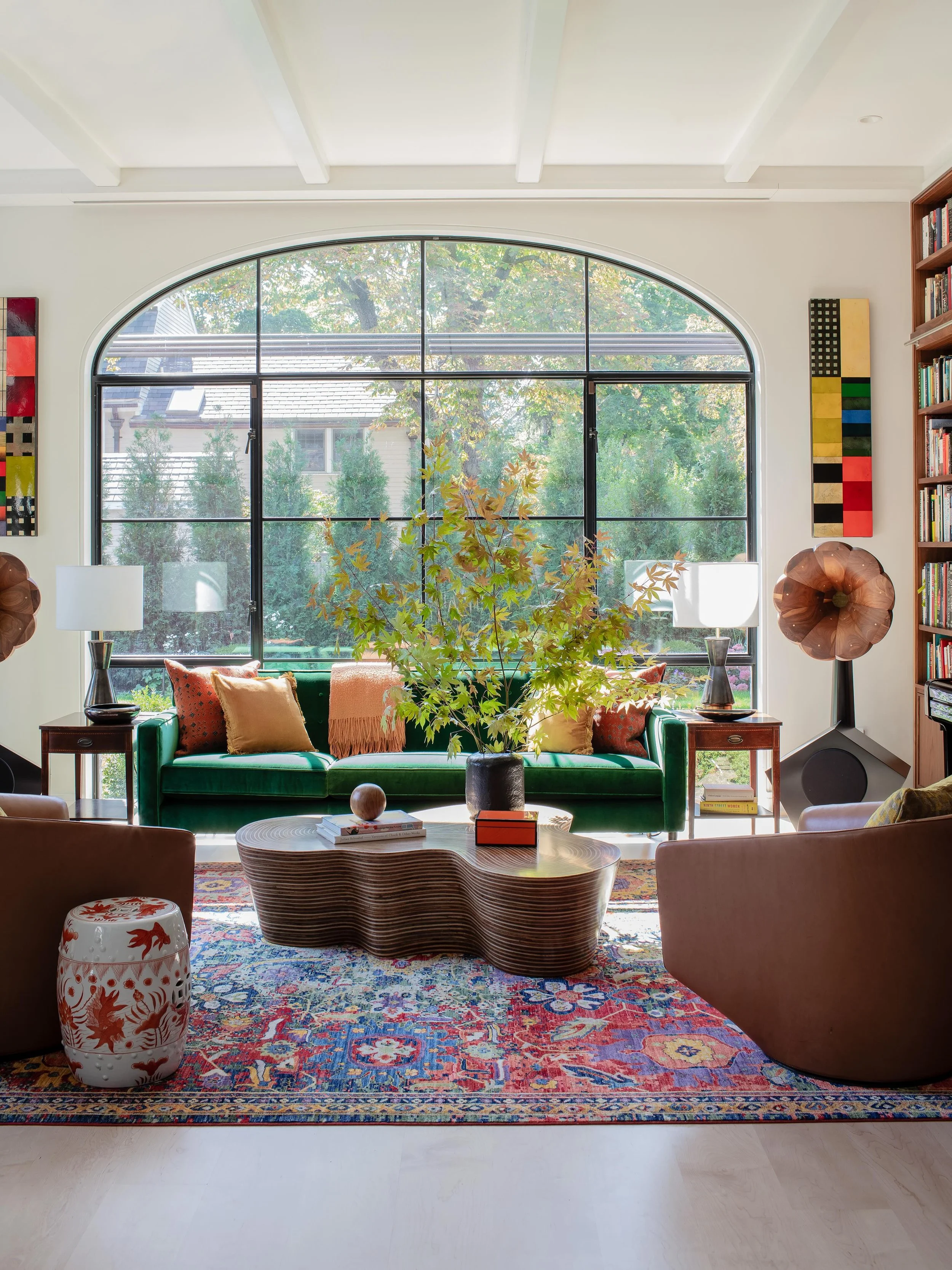 Design tip: anchor a room with one strong move. Here, it&rsquo;s the green sofa. Everything else supports it without competing.

Project: #TheCambridgeArtFULLHome
Photographer: @michaeljleephotography
Architect: @crmpartners
Builder: @columbiacontrac