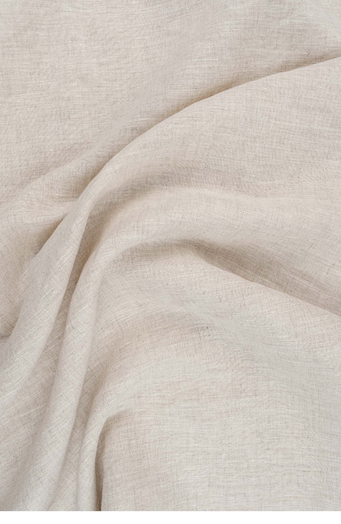 Close-up of beige linen fabric with natural texture and folds.