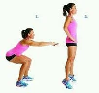 A woman demonstrates proper squat form, starting in a squat position and then standing up.