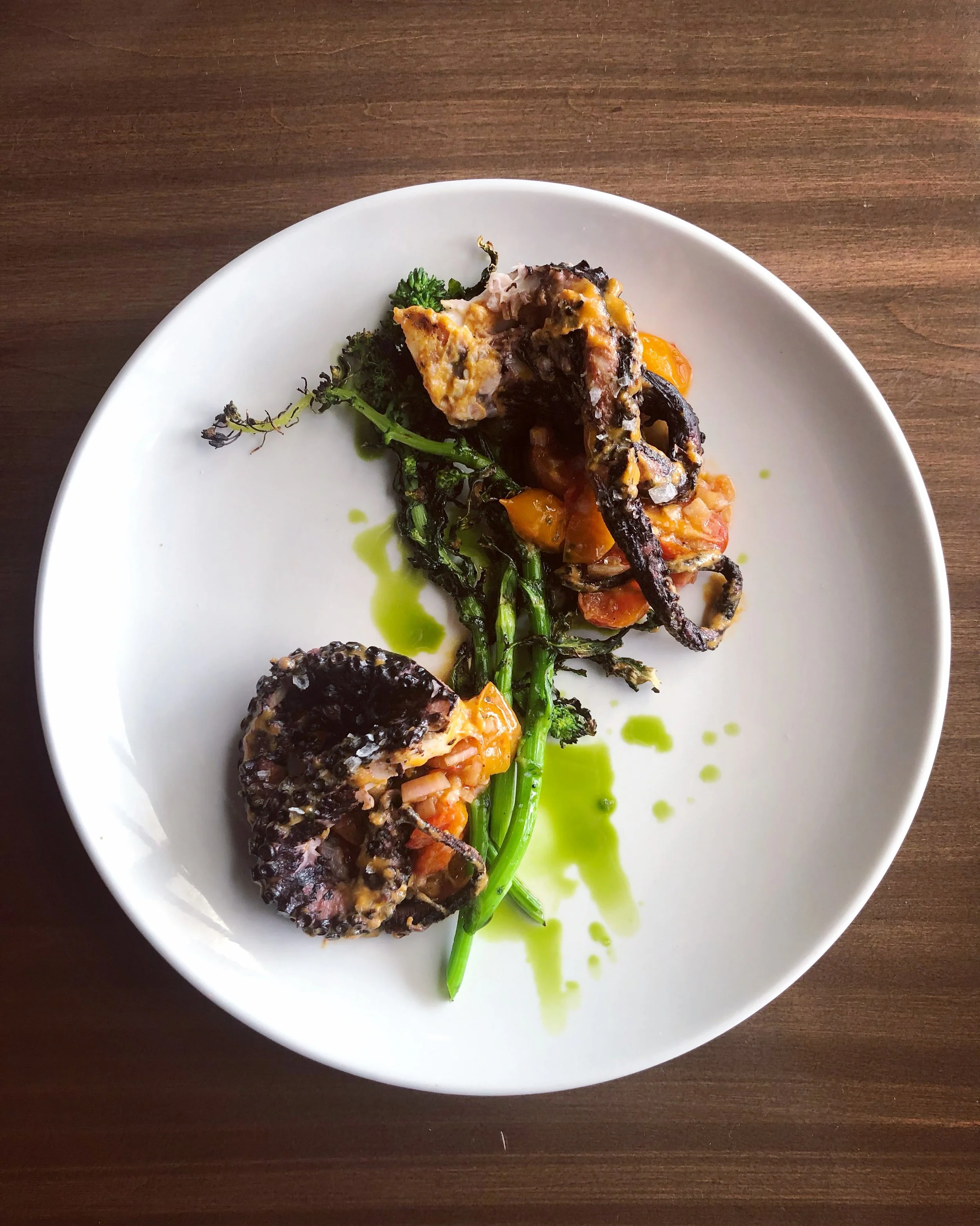 Summer: Grilled octopus, broccolini, blistered tomatoes, nduja vinaigrette