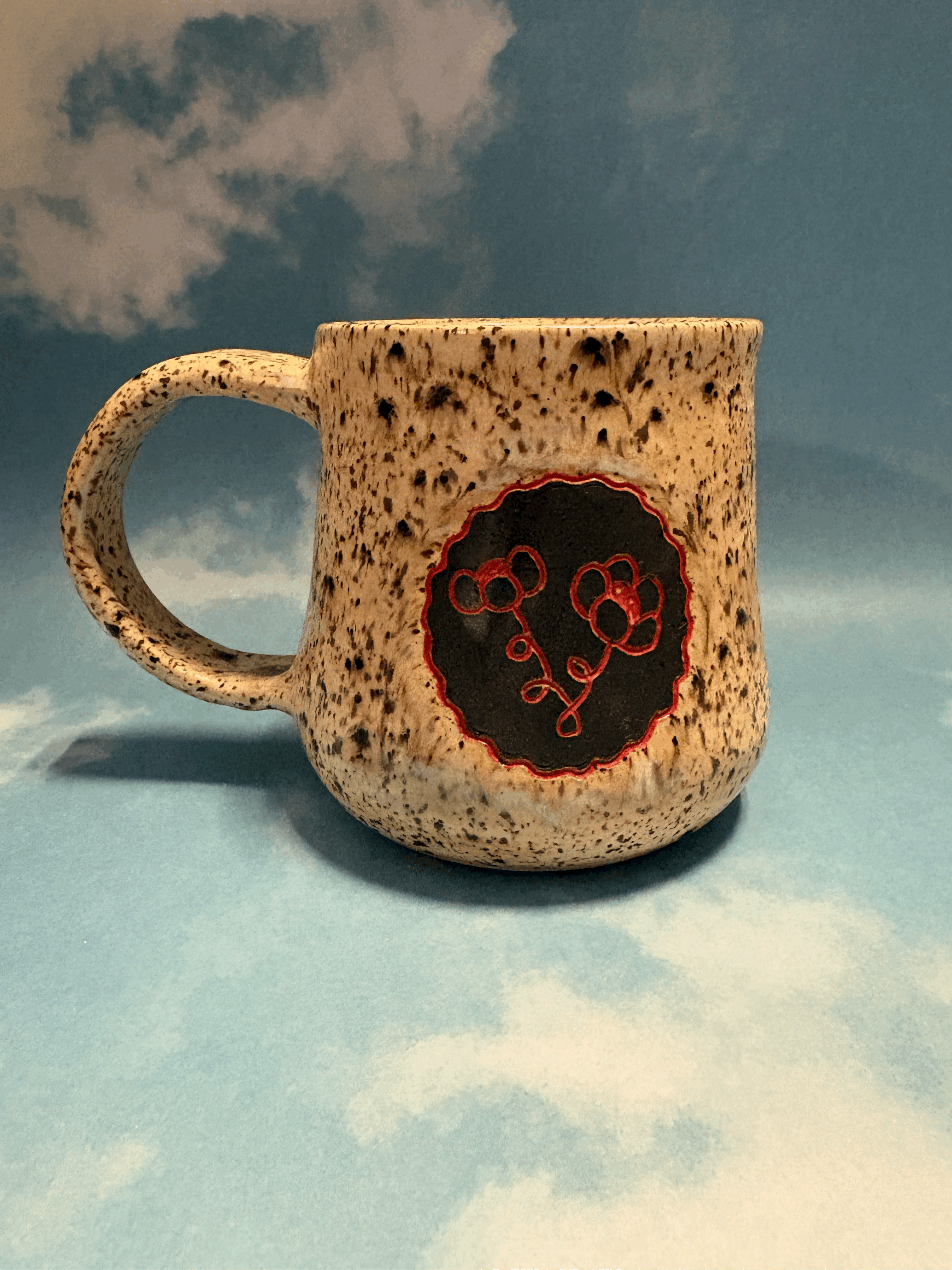 red flower mug