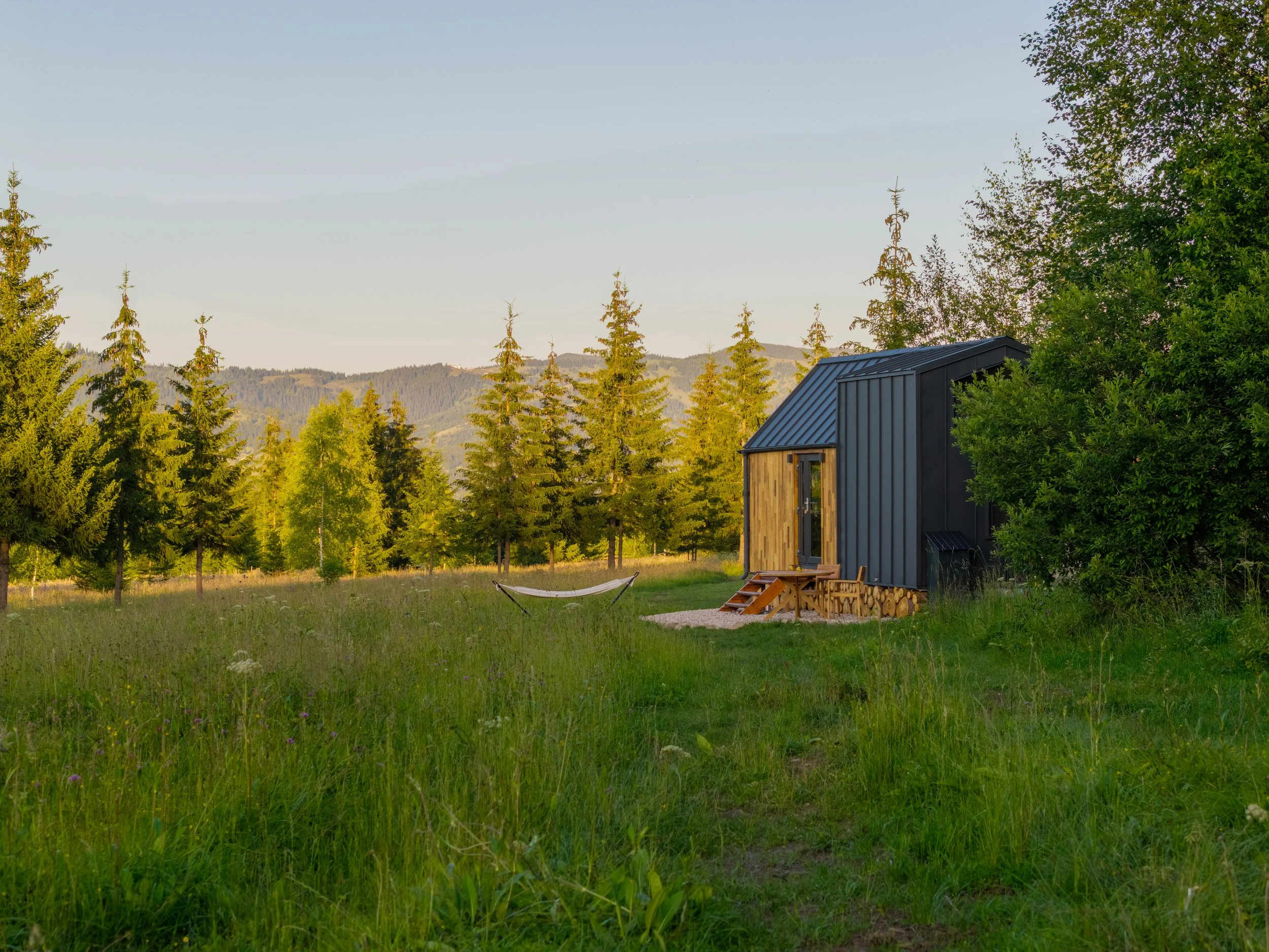 WildKind Nature Retreat Blue Tiny House with a hammock, Tara Dornelor Romania
