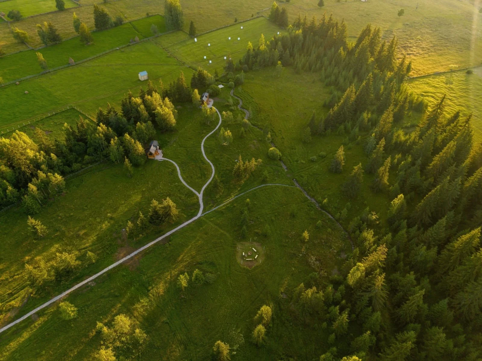 aerial view of the 2 tiny houses at WildKind Nature Retreat Tara Dornelor Romania