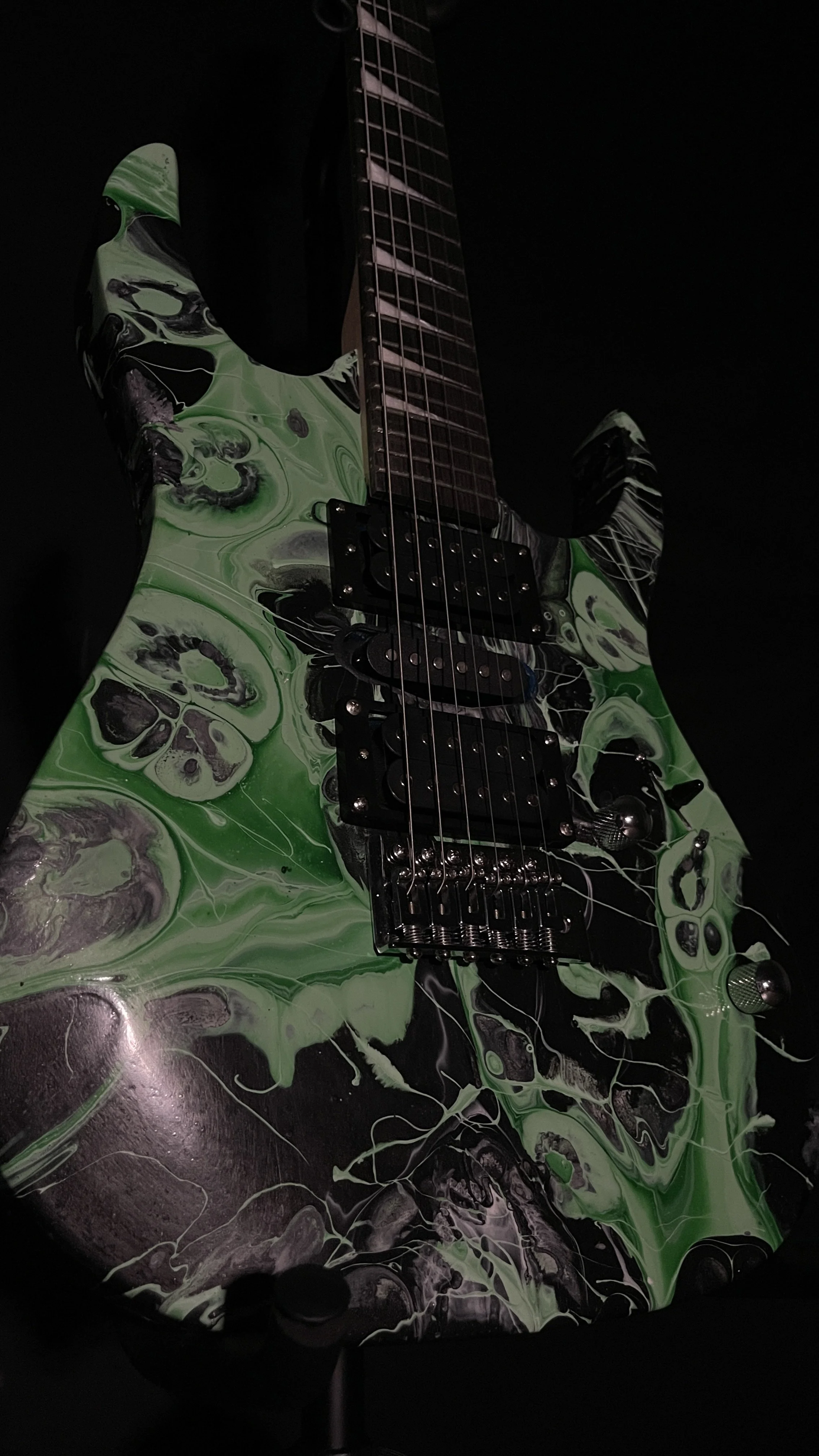 Black and green acrylic poured electric guitar
