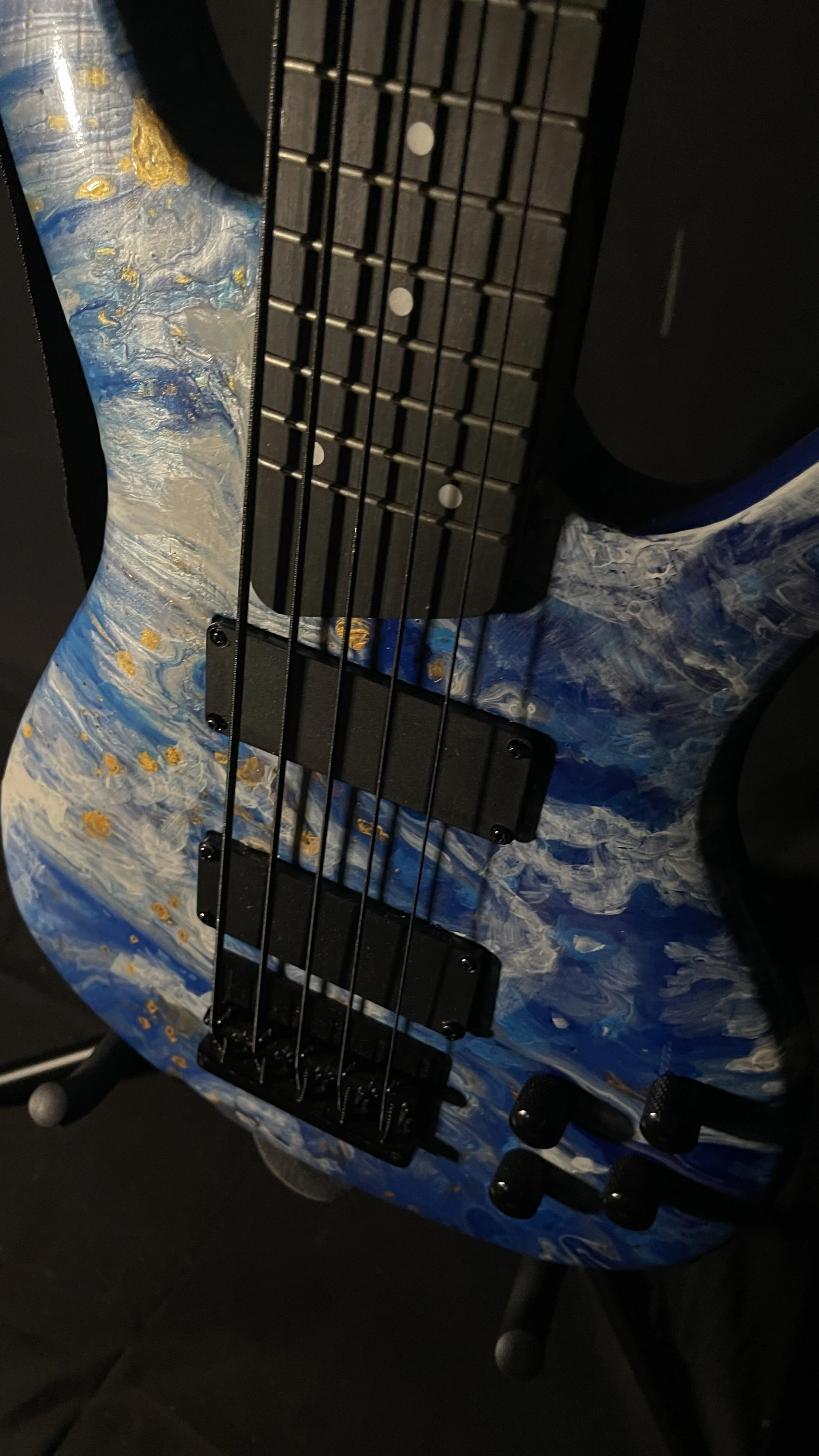 Blue, white and gold acrylic pour on a 5-string electric bass named Thalassa