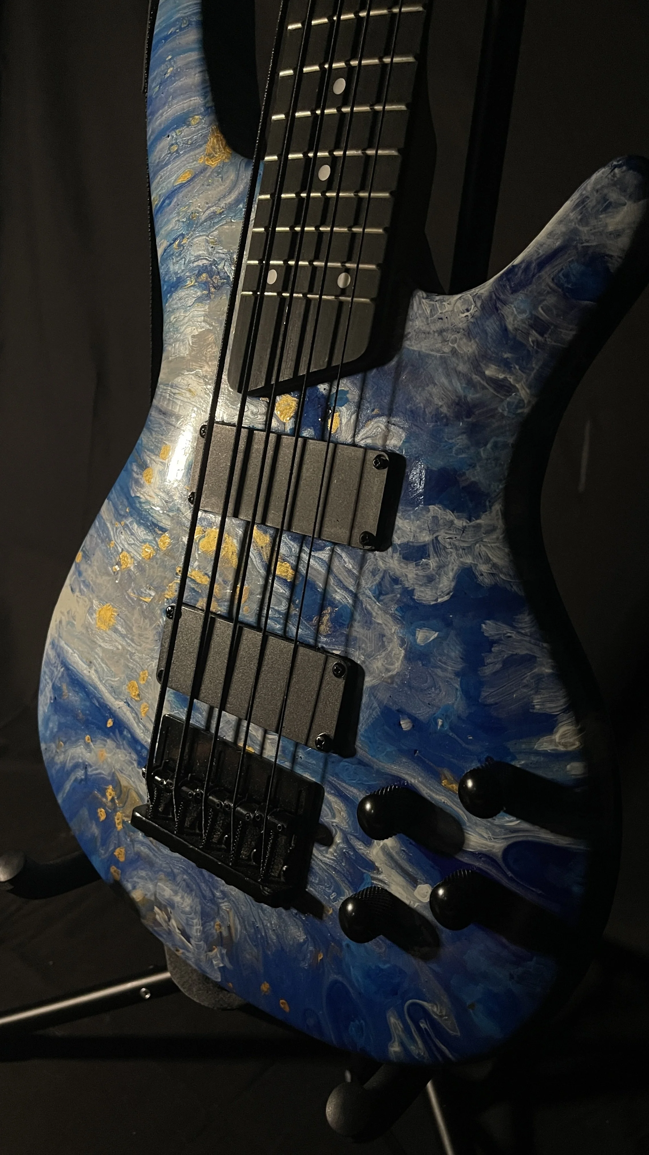 Blue, white and gold acrylic pour on a 5-string electric bass named Thalassa