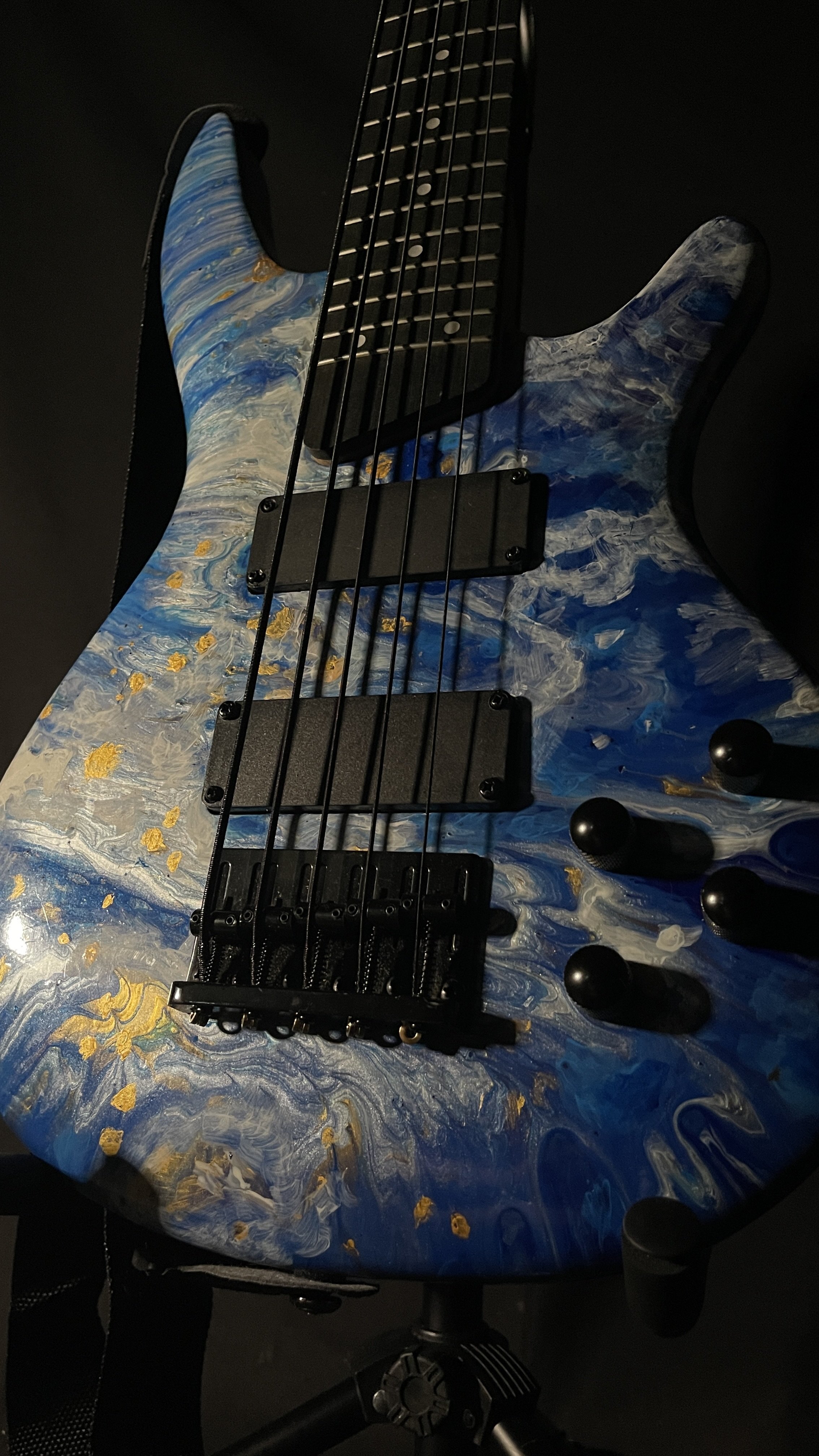 Blue, white and gold acrylic pour on a 5-string electric bass named Thalassa