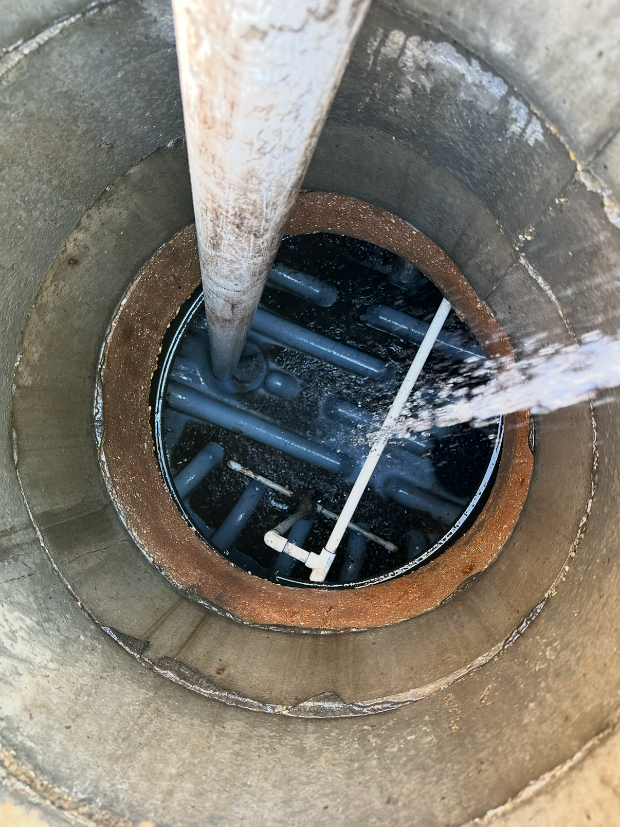 Hover Septic Services performing sewage treatment plant cleaning and inspection in South Louisiana
