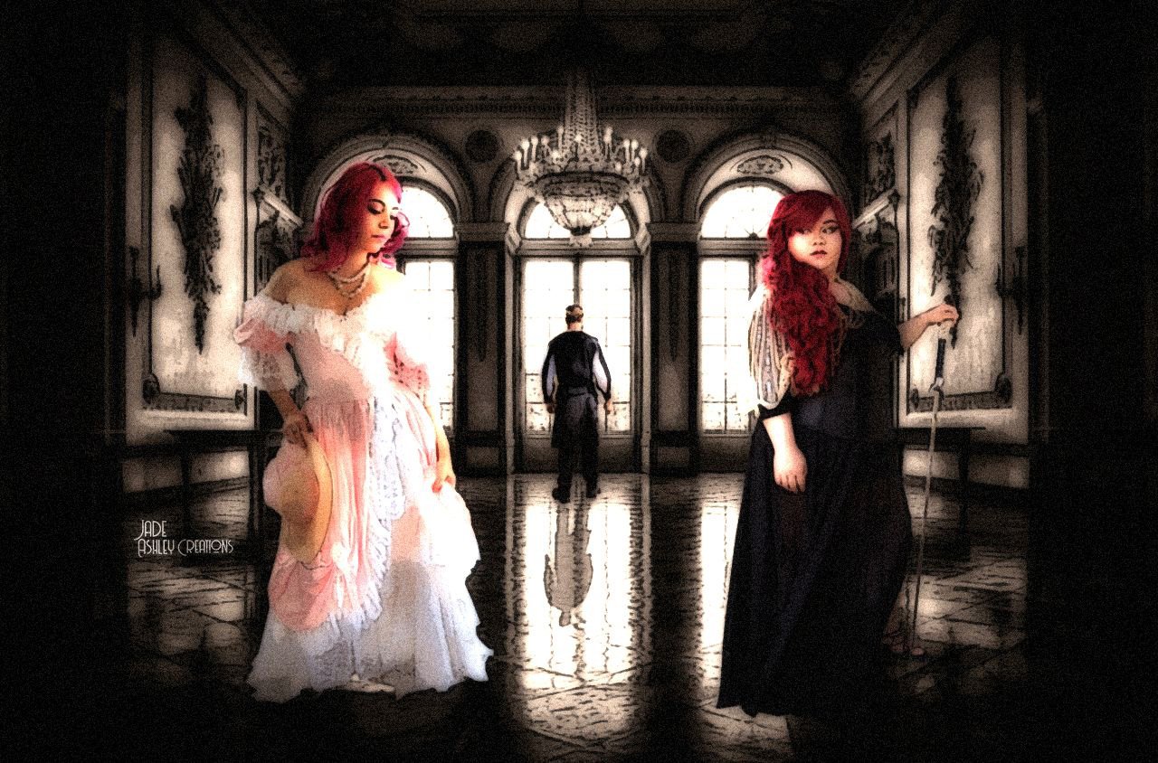 Two women with red hair in elegant dresses standing in a luxurious, ornate room with large windows, while a man with short hair and dark clothing stands in the background facing the windows.