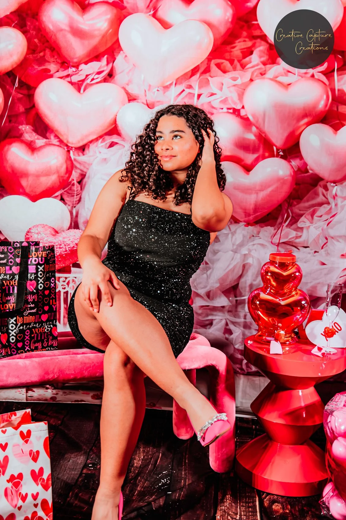 woman dressed in black sparkle dress to celebrate her 21 birthday