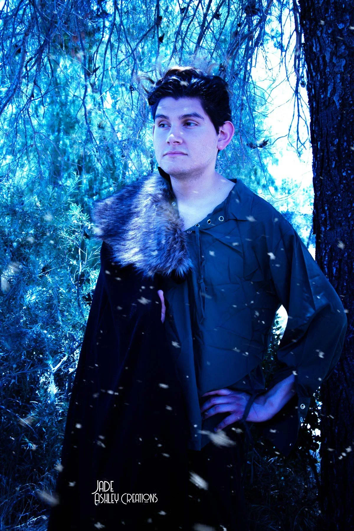 man dressed ina fur coat to resemble game of thrones in the snow