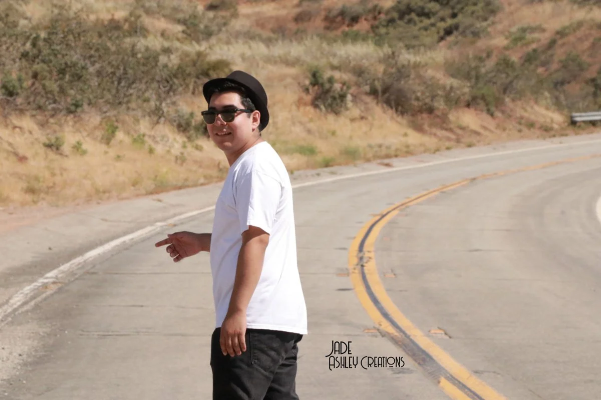 man with hat on the road