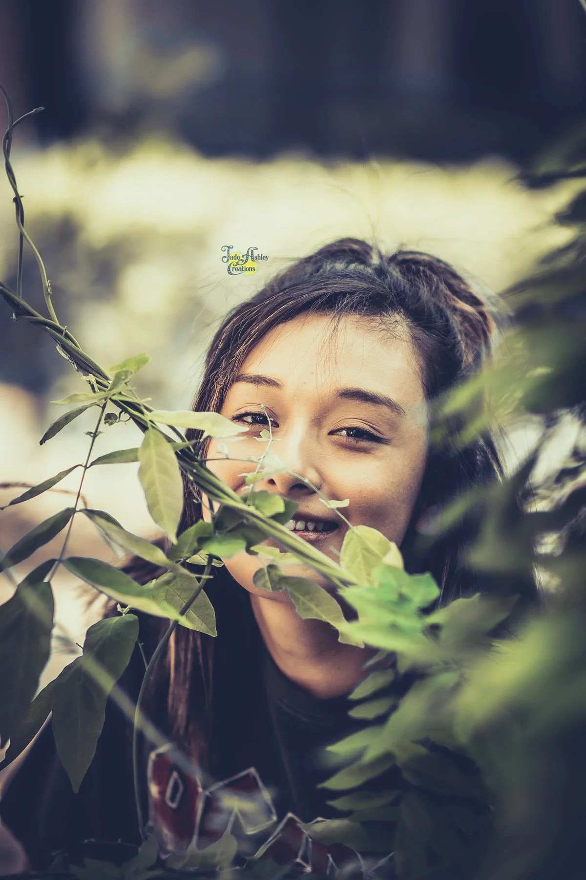 woman behind a tree leaf