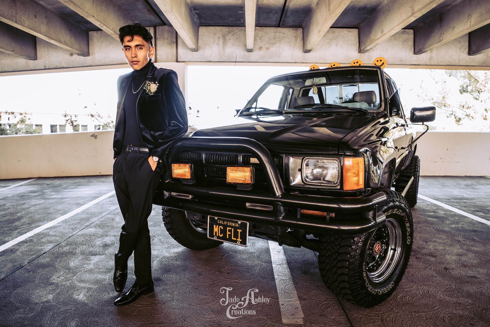 man getting ready for prom with the mcfly truck from back to the future