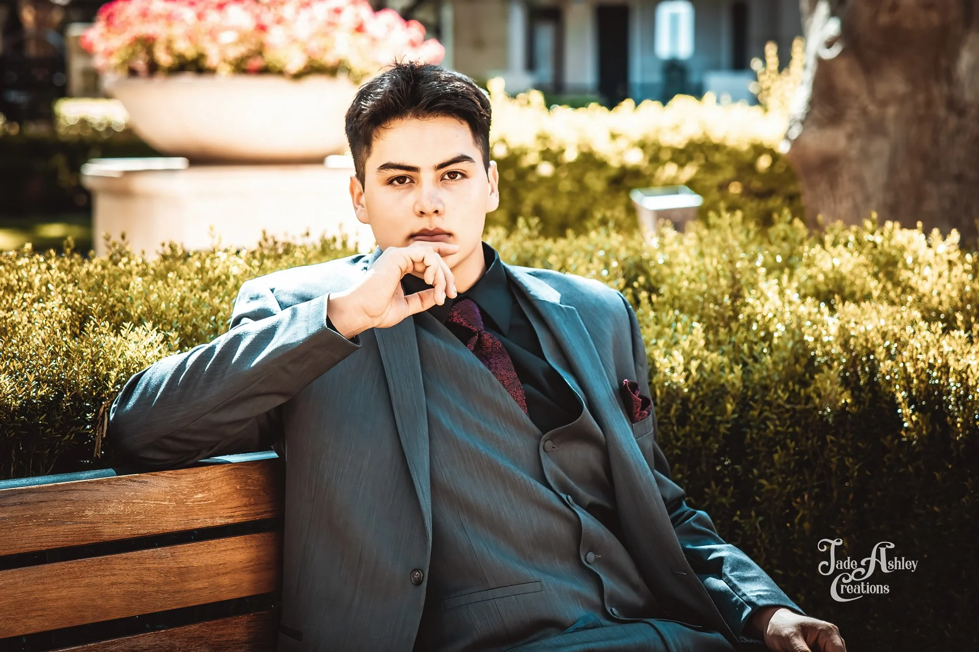 man at prom photos in a suit