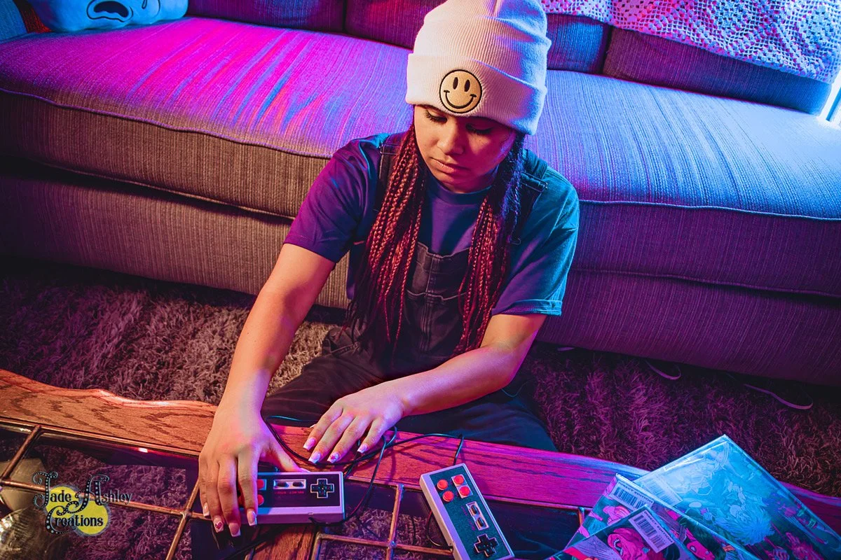 woman dressed 90s outfit overalls playing retro games