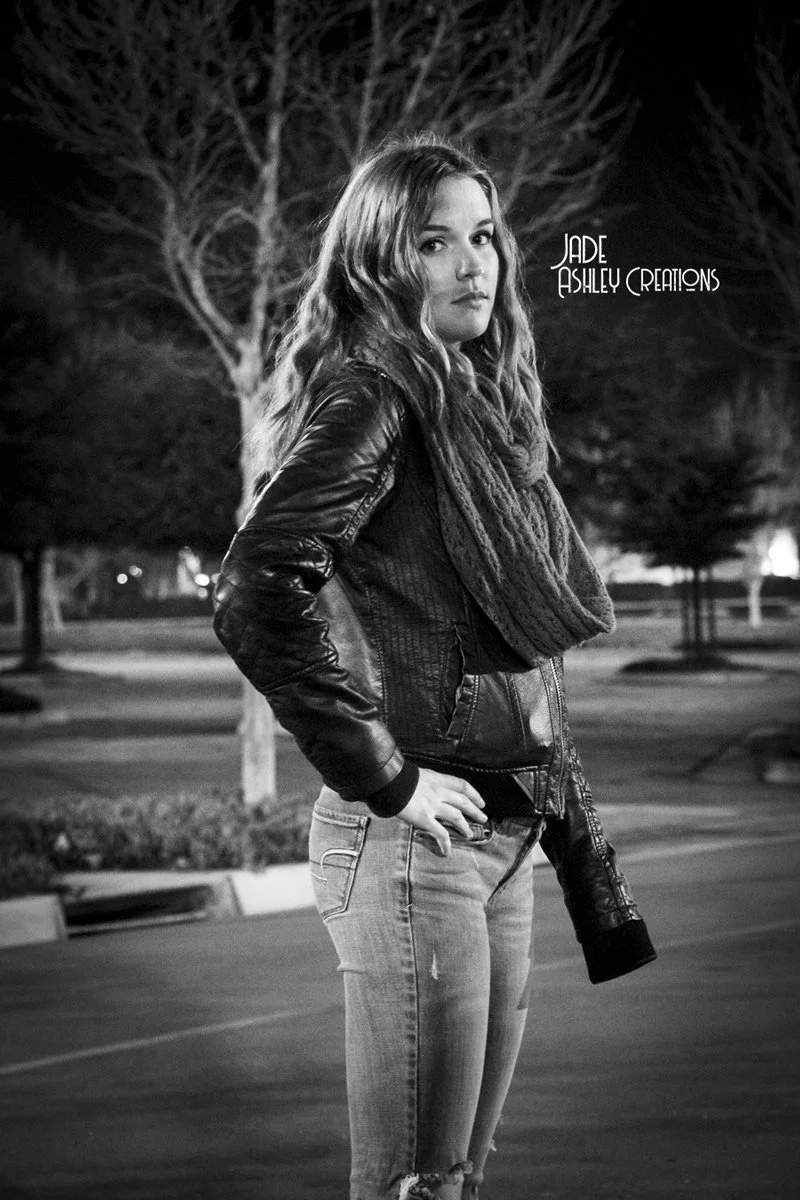 woman posing at night