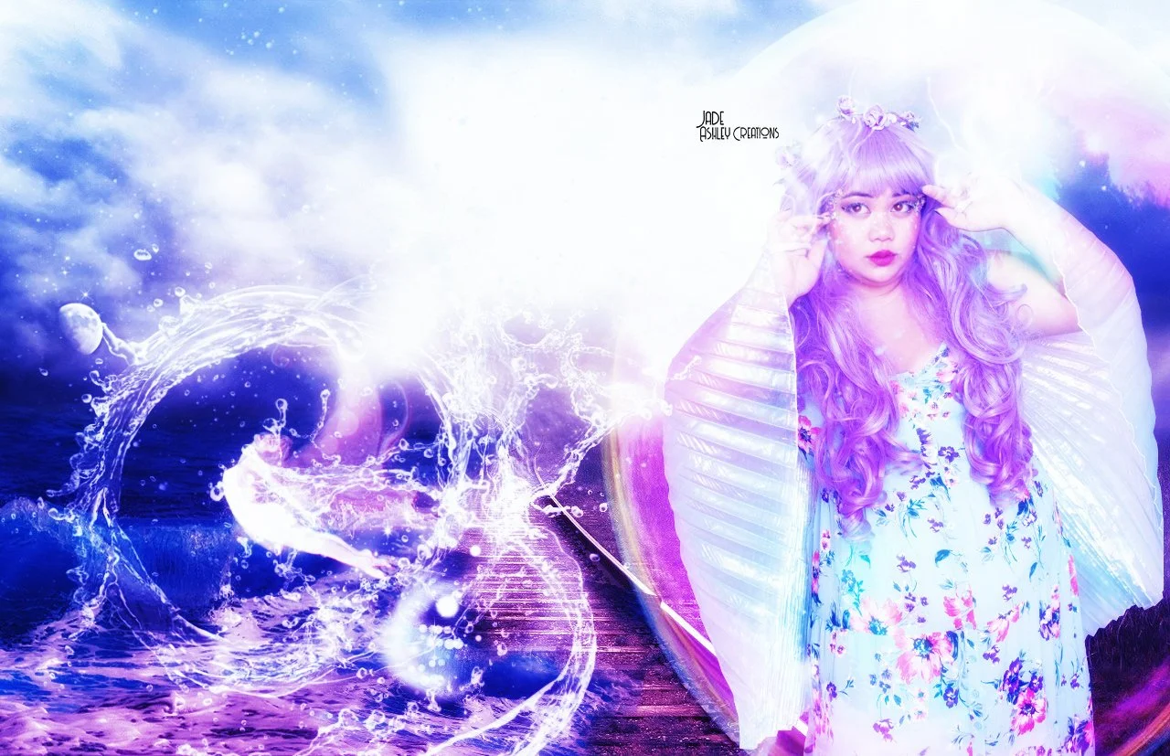 A woman with long curly lavender hair in a floral dress and a white metallic jacket posing with her hands near her head, against a dreamy sky and ocean background with digital water and light effects.