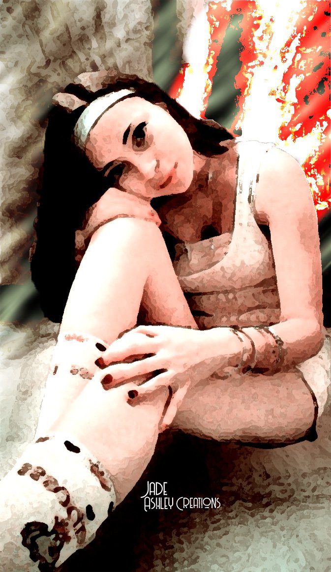 A young woman with black hair and a headband sitting on the floor, holding and touching her leg, with a colorful abstract background.