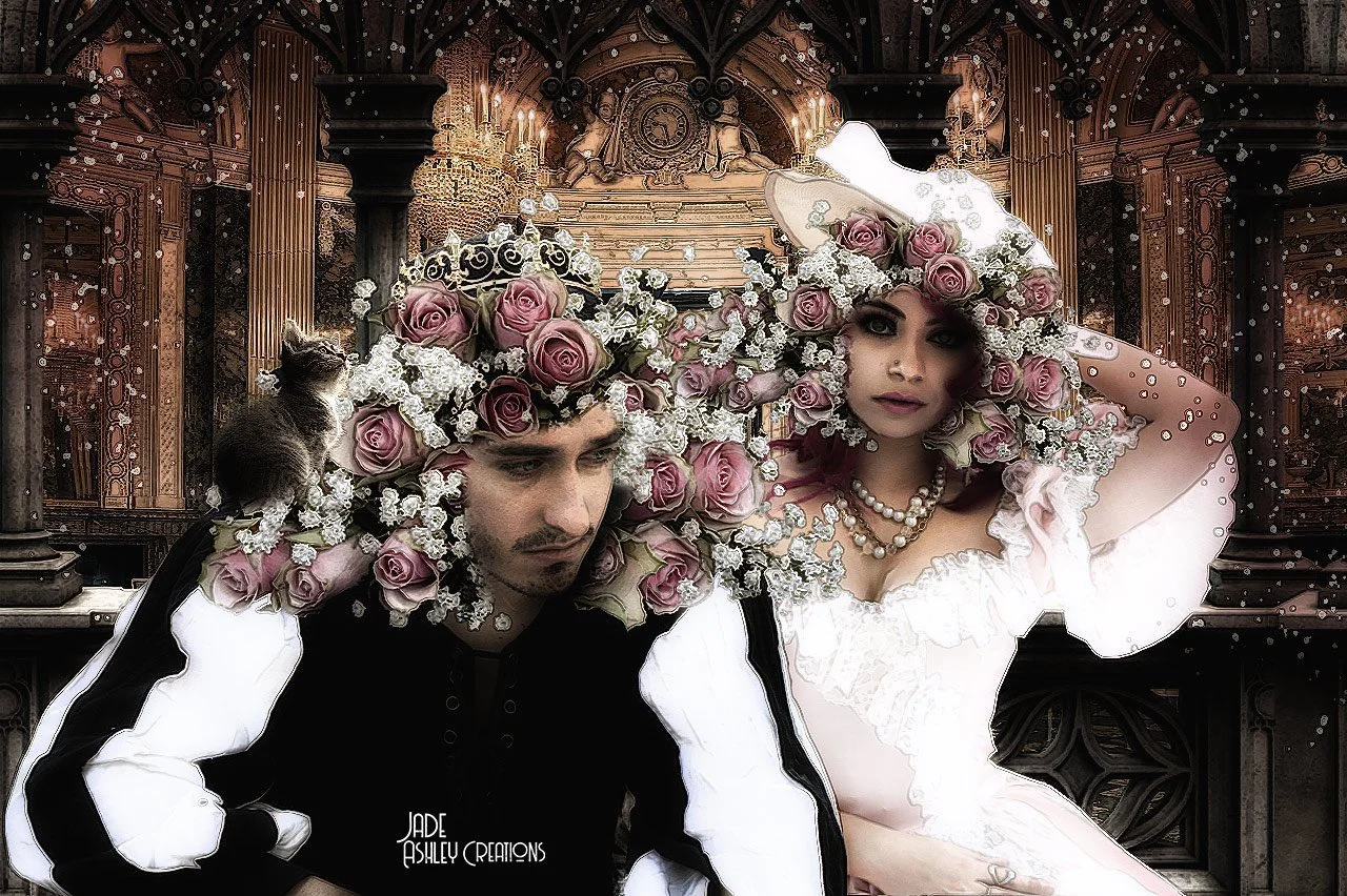 Two individuals dressed in vintage-style clothing with floral headpieces in front of an ornate, chandelier-lit, wooden interior background.