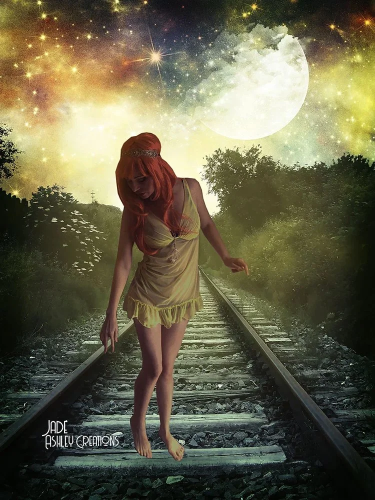 A woman with long red hair and a yellow dress is walking barefoot on train tracks in a surreal night scene with a large full moon and starry sky.