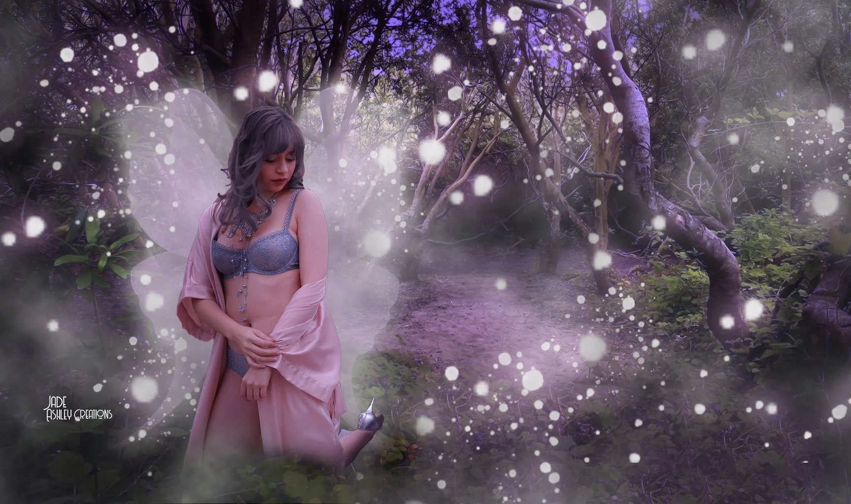 A woman with gray hair wearing blue lingerie and a pink robe stands in a mystical, enchanted forest with glowing particles surrounding her.