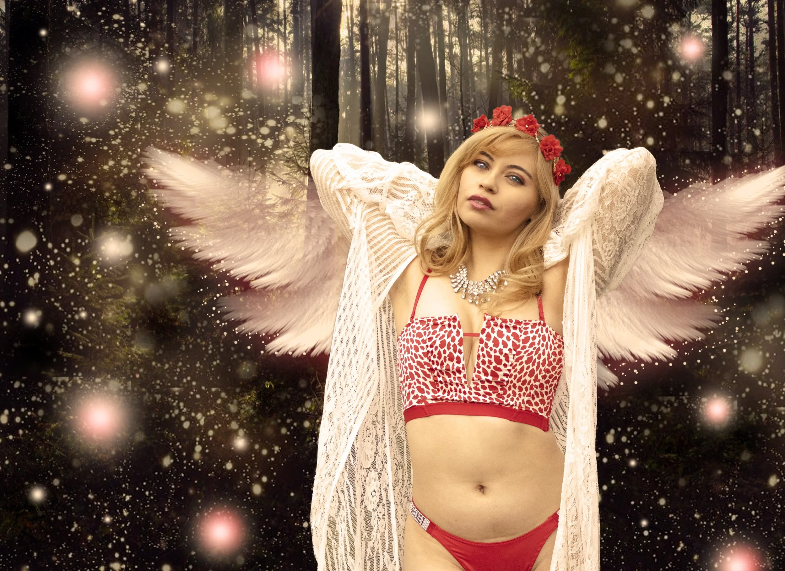 A woman with angel wings, wearing red lingerie with a white and red pattern, standing in a forest with glowing lights and sparkles, wearing a floral headband and a diamond necklace.