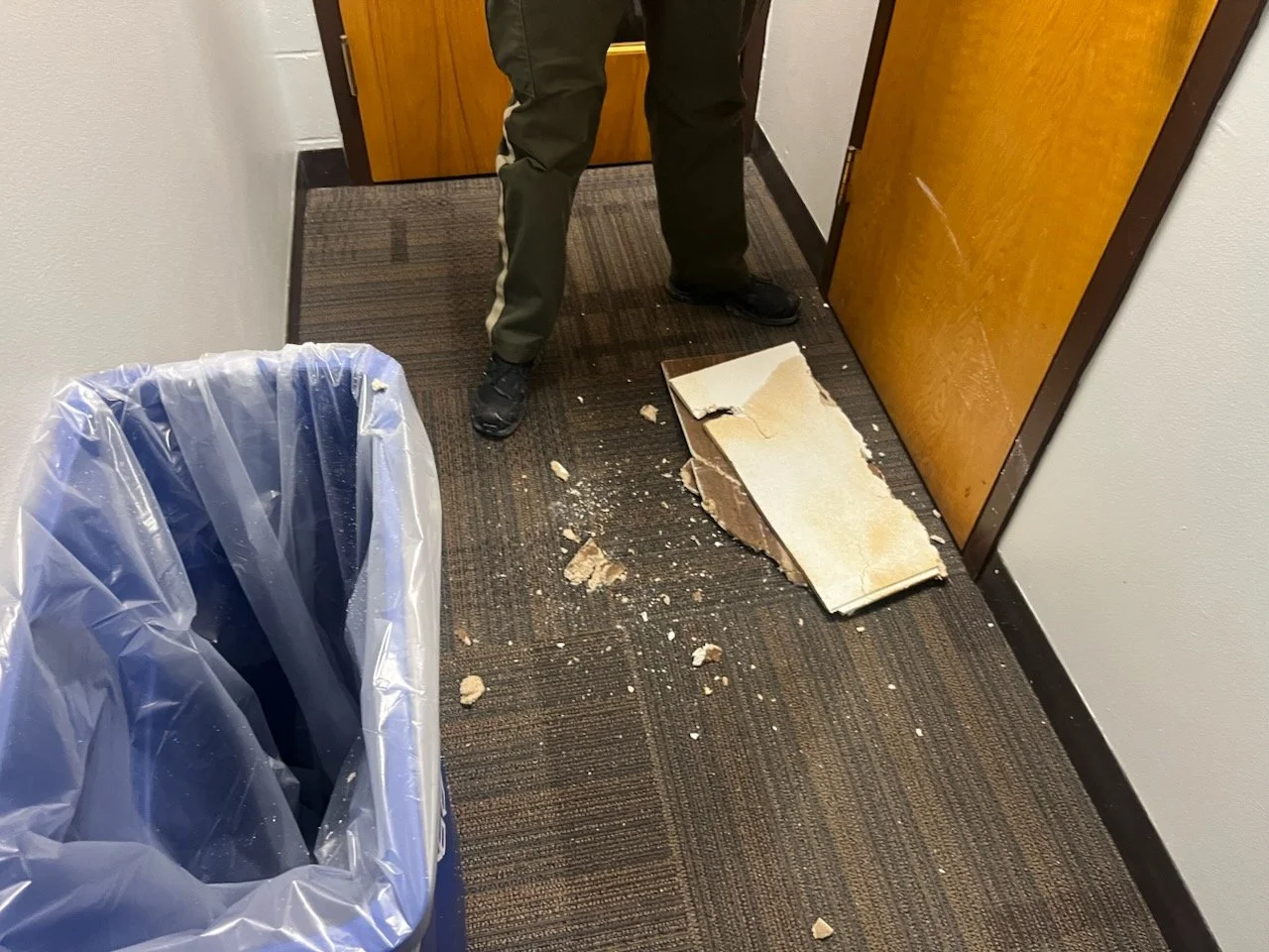 Another collapsed ceiling tile from water exposure.