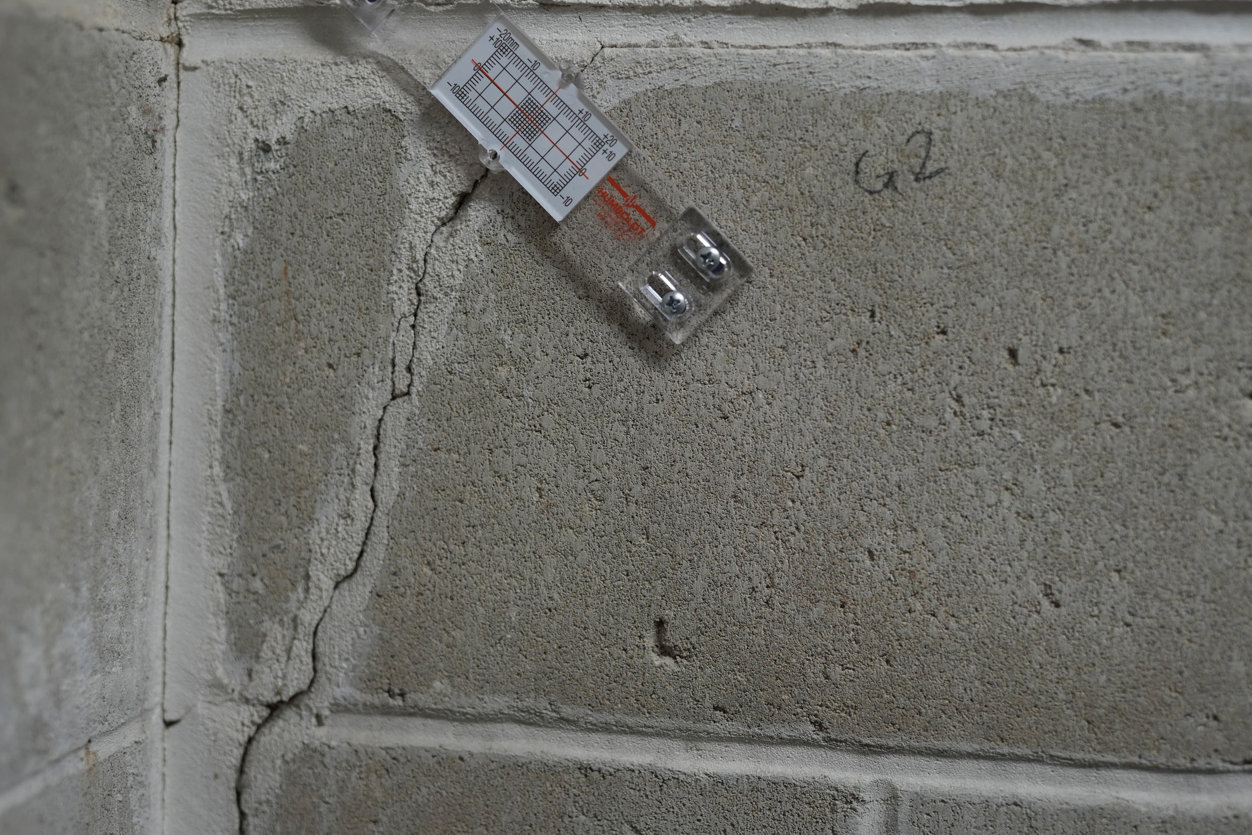 Crack gauges have been added to the facility to monitor structural integrity.