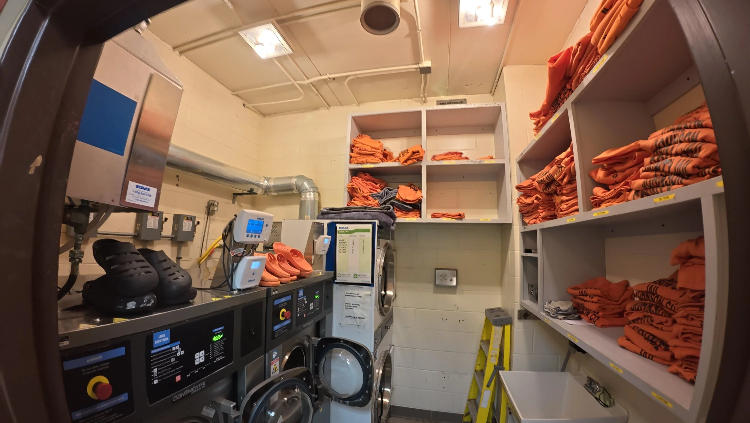 The laundry room is too small, and excess jumpsuits are stored in hallways. 