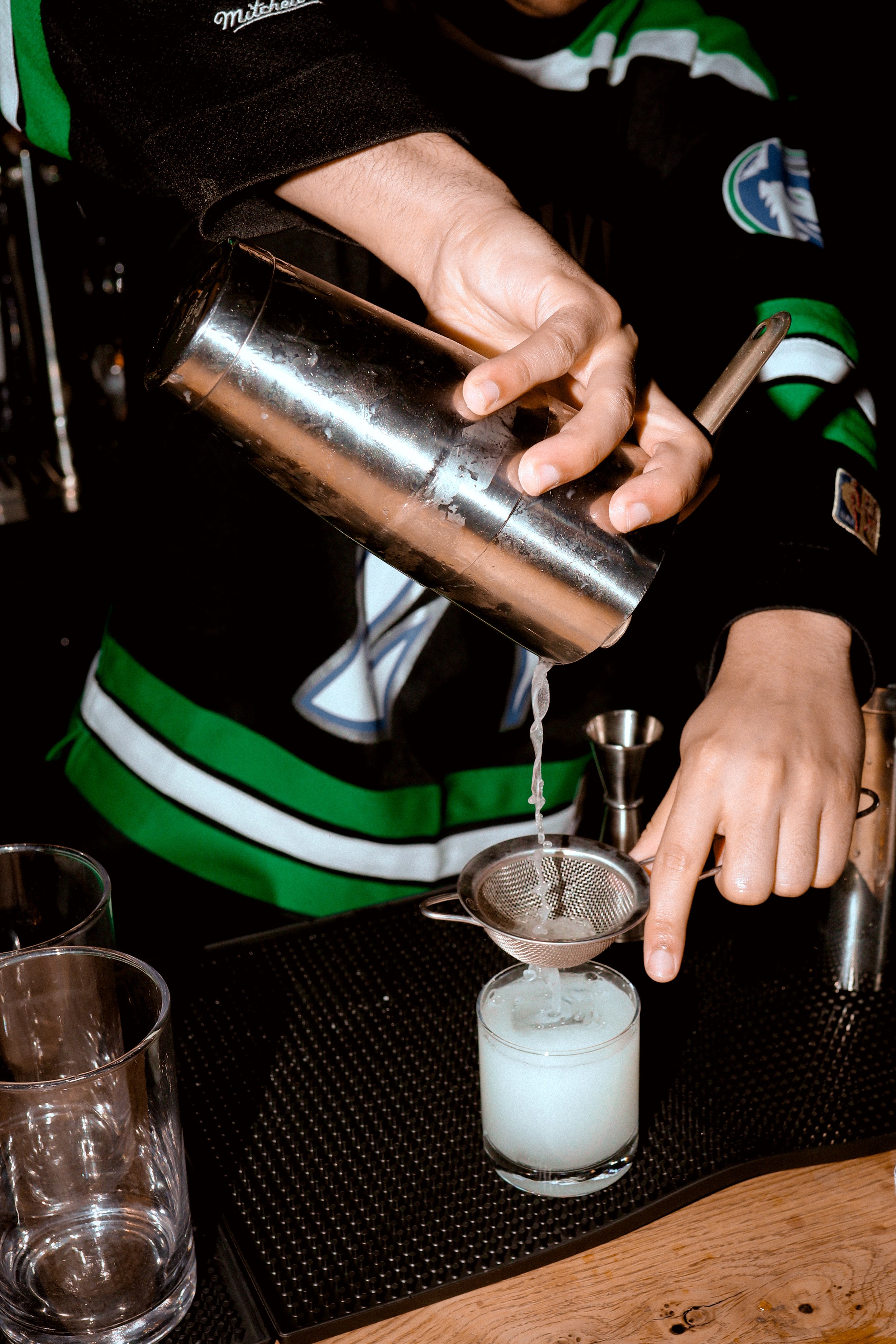 Bartender pouring a drink 