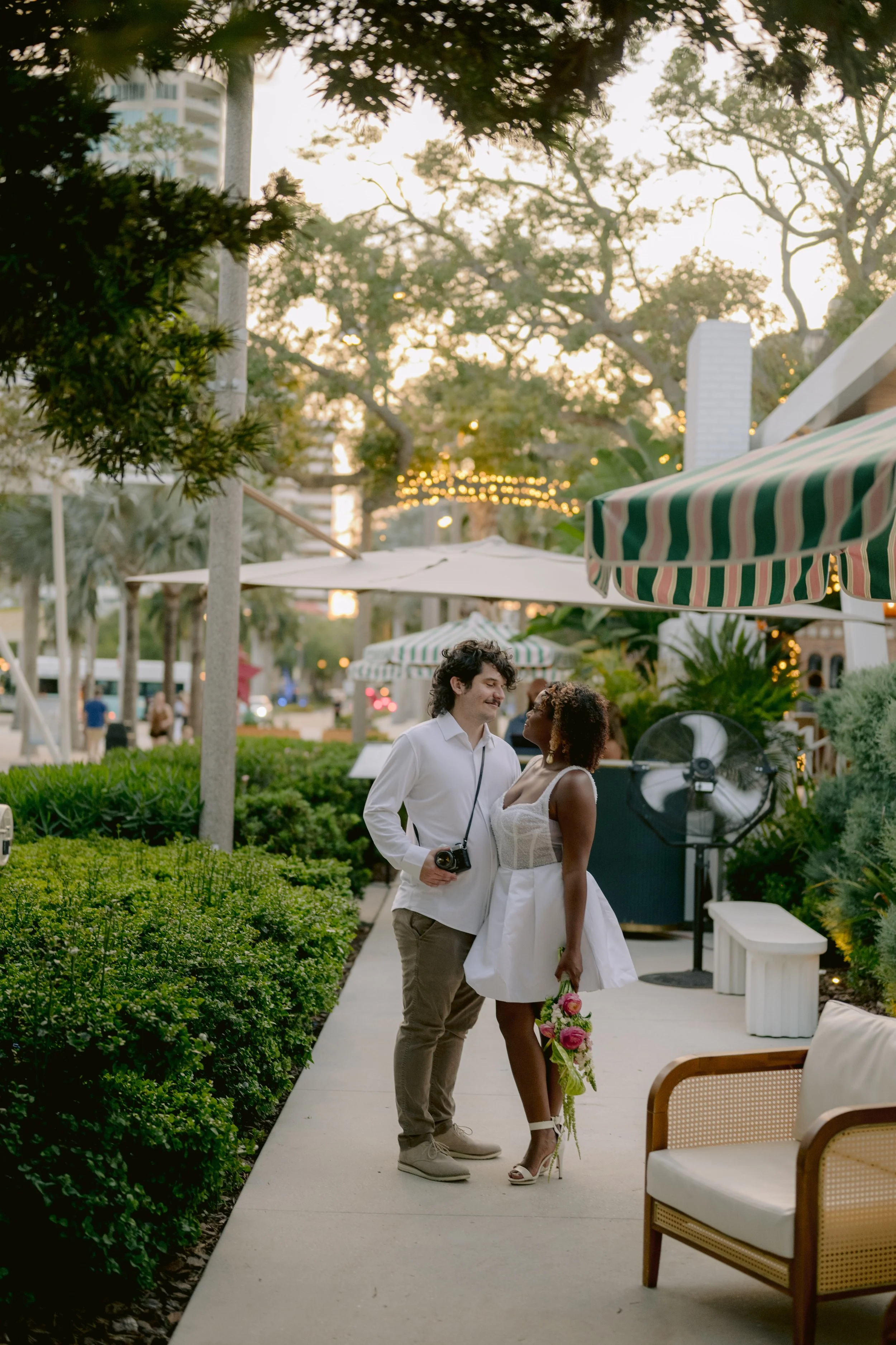 Candid lifestyle wedding couple portraits among St Petersburg Florida palm trees.jpg
