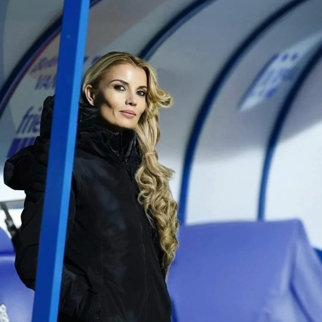 Dr. Annemieke Griffin, Founder and CEO of StatuMentis, Mental Performance and Behavior specialist, photographed at a professional football stadium — representing fifteen years of elite sport performance work across the Premier League and major clubs