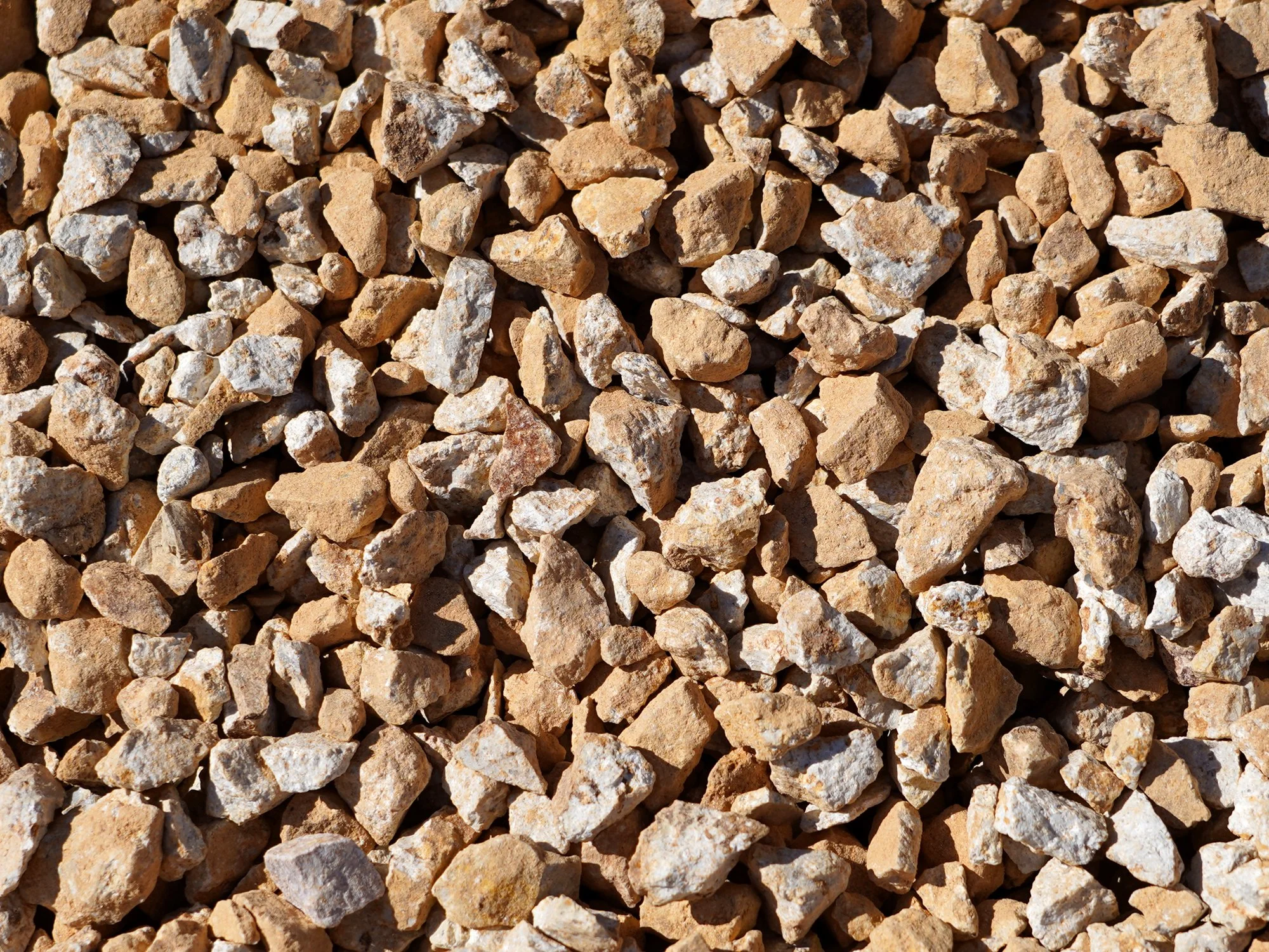 ¾” crushed tan decorative stone, landscaping rock for garden beds, pathways, and borders